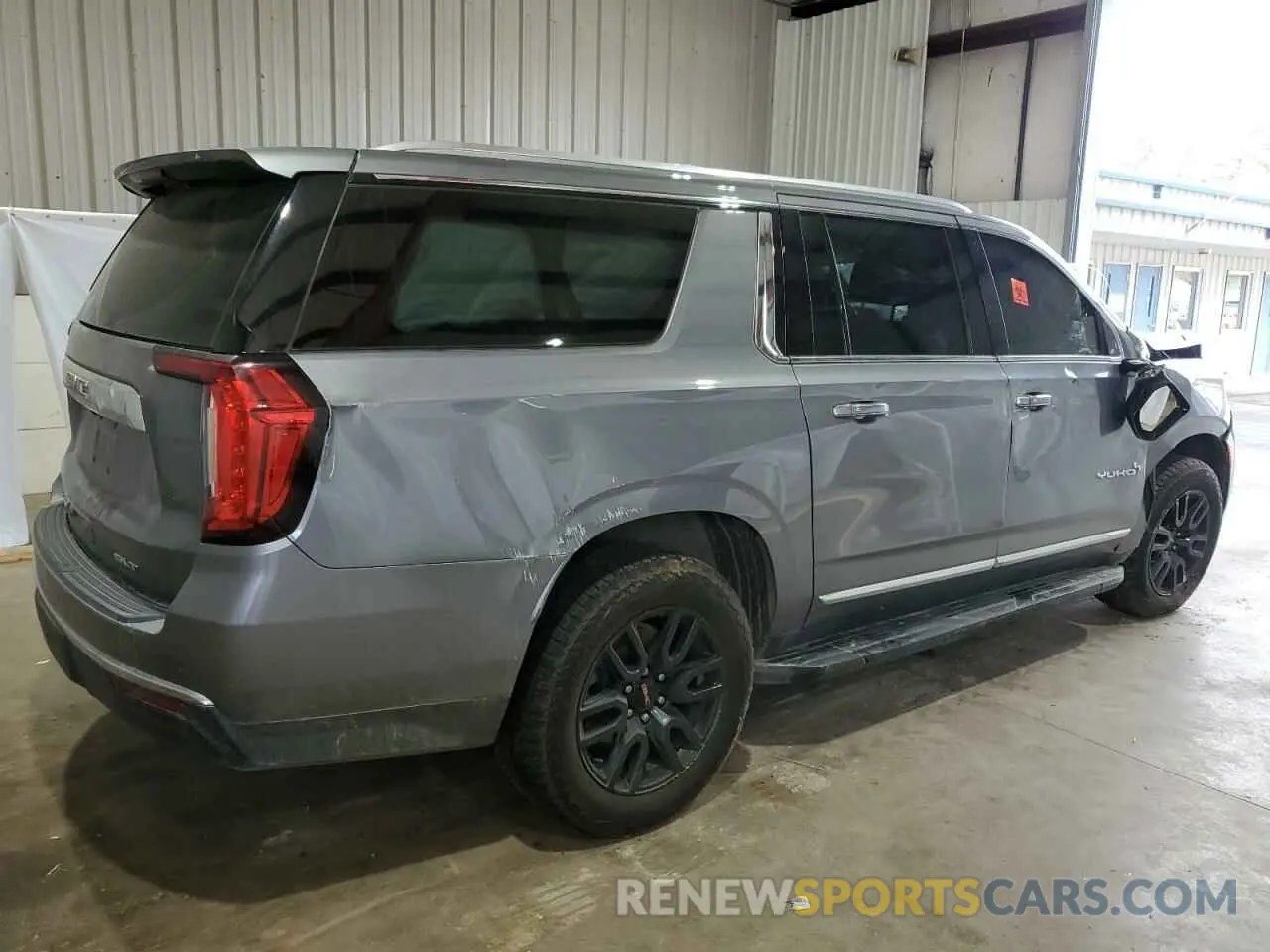 3 Photograph of a damaged car 1GKS2GKT1MR310067 GMC YUKON 2021