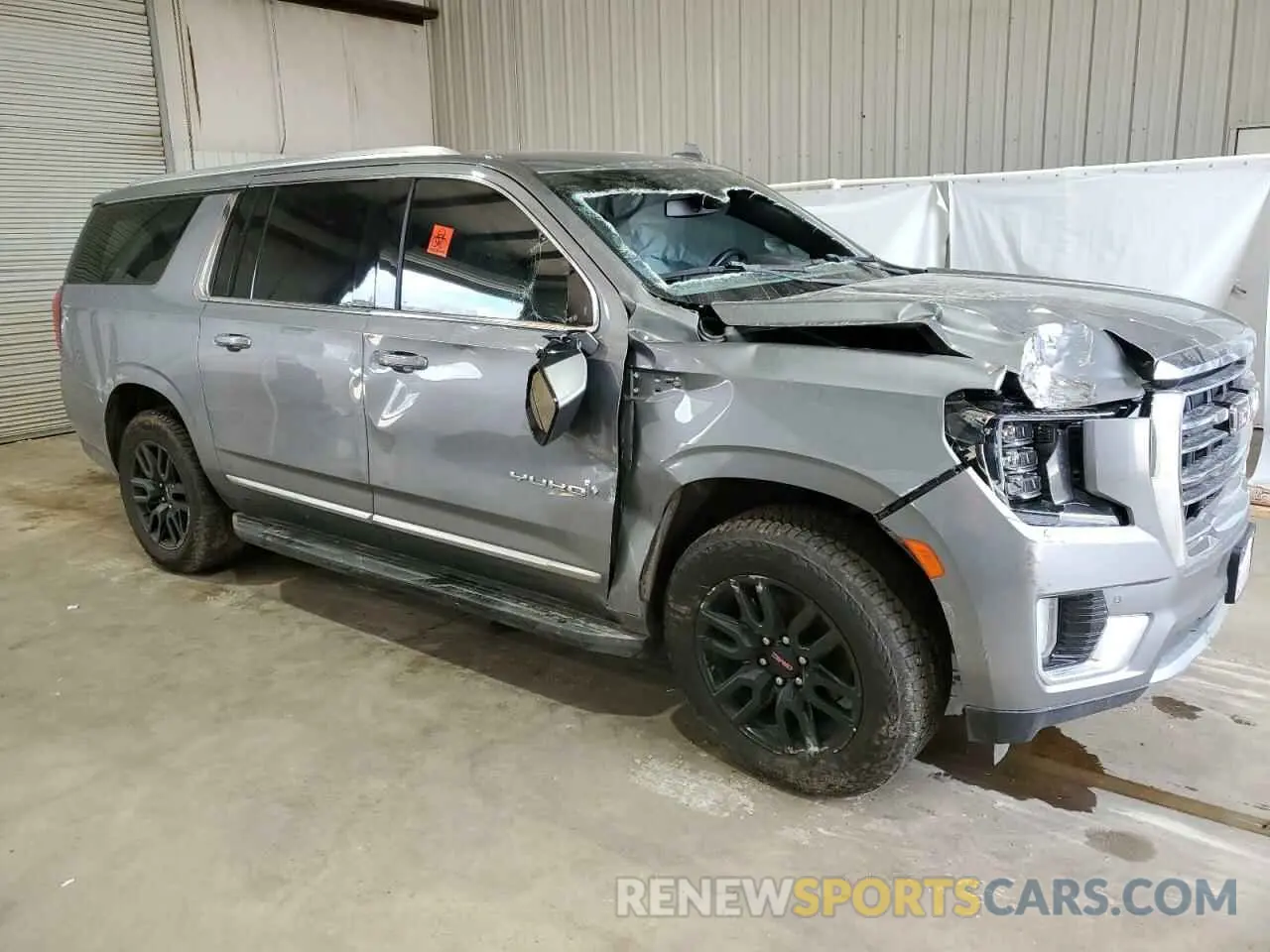4 Photograph of a damaged car 1GKS2GKT1MR310067 GMC YUKON 2021