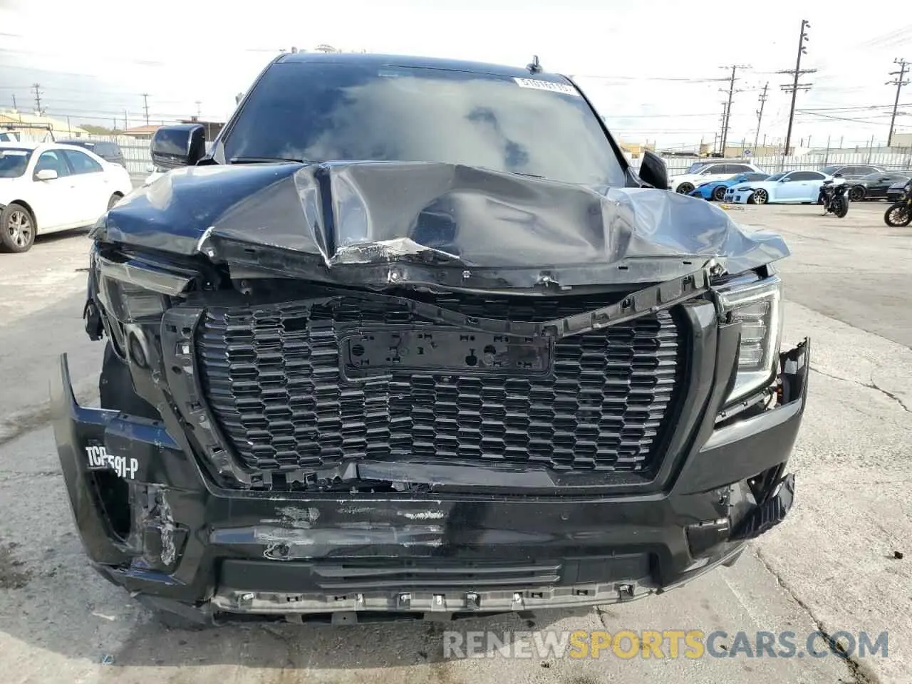 5 Photograph of a damaged car 1GKS2JKL7MR217440 GMC YUKON 2021