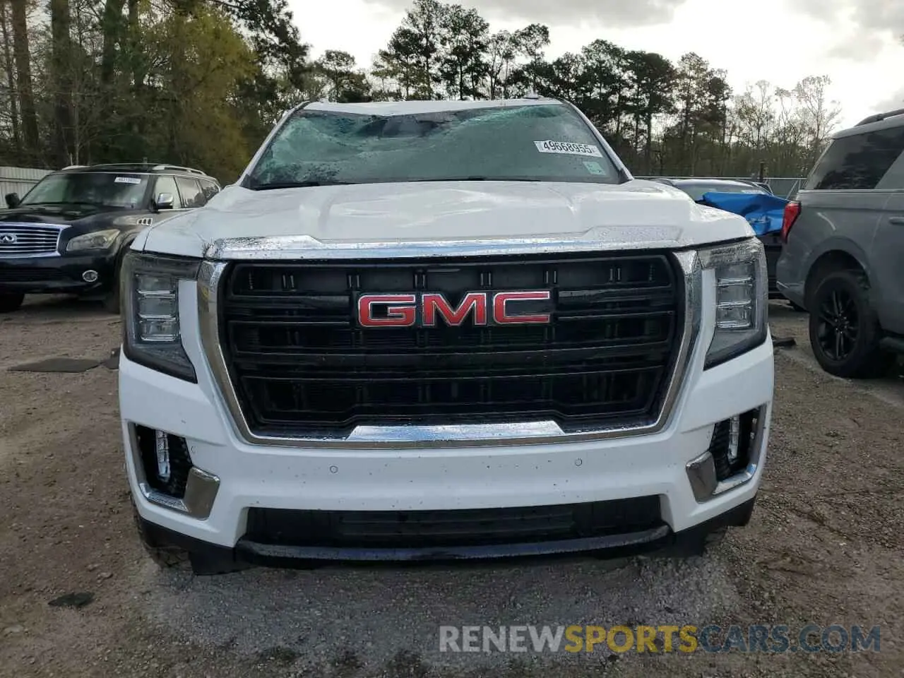 5 Photograph of a damaged car 1GKS1AKD7NR201865 GMC YUKON 2022