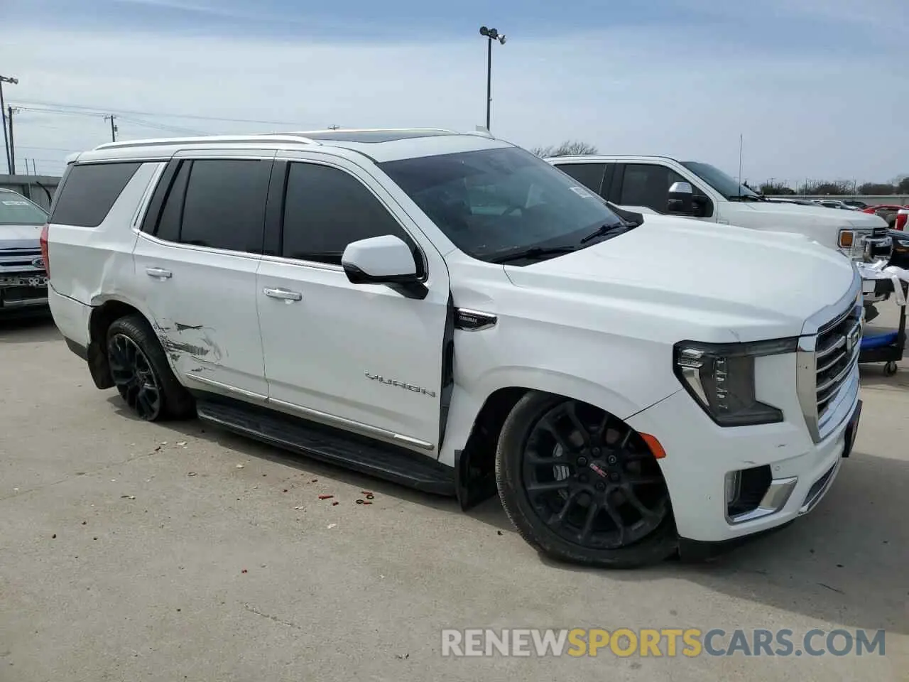 4 Photograph of a damaged car 1GKS1BKT8NR235858 GMC YUKON 2022