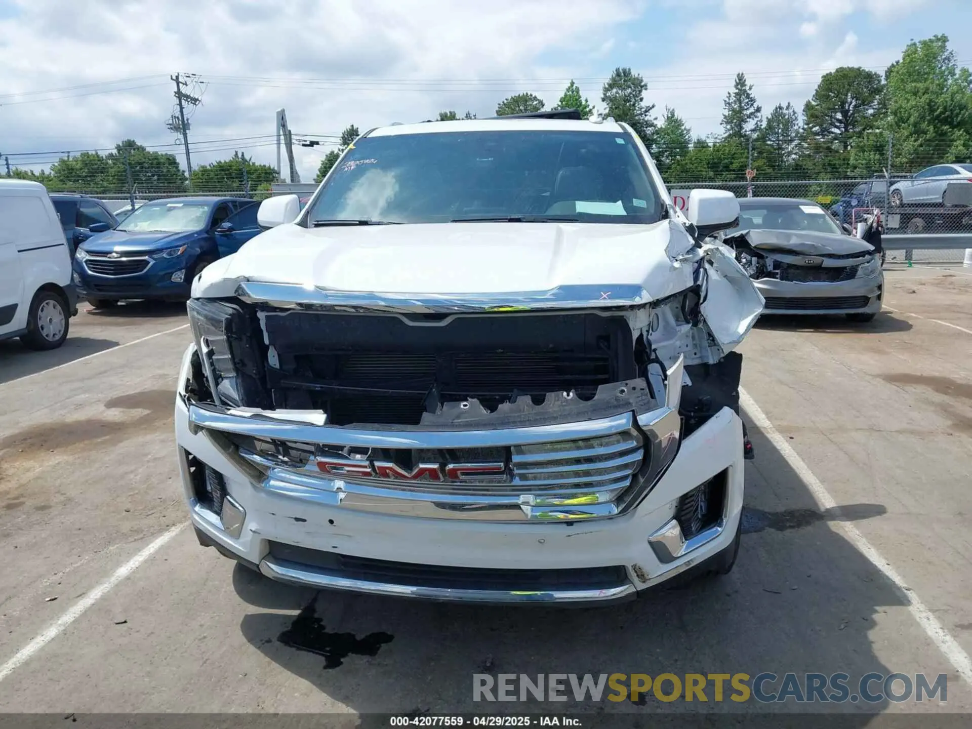 12 Photograph of a damaged car 1GKS2BKD3NR165465 GMC YUKON 2022