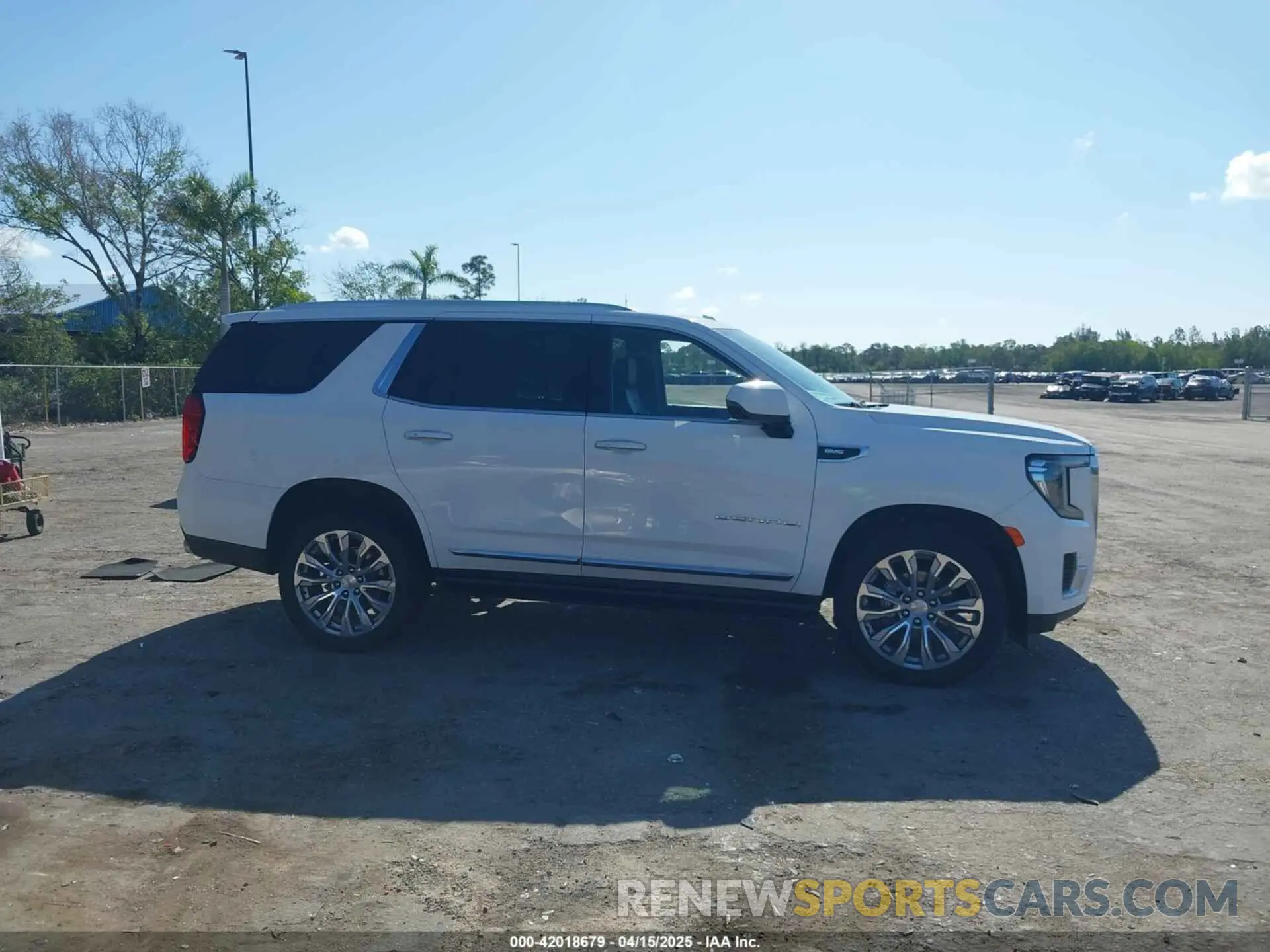 13 Photograph of a damaged car 1GKS1DKL2PR303909 GMC YUKON 2023
