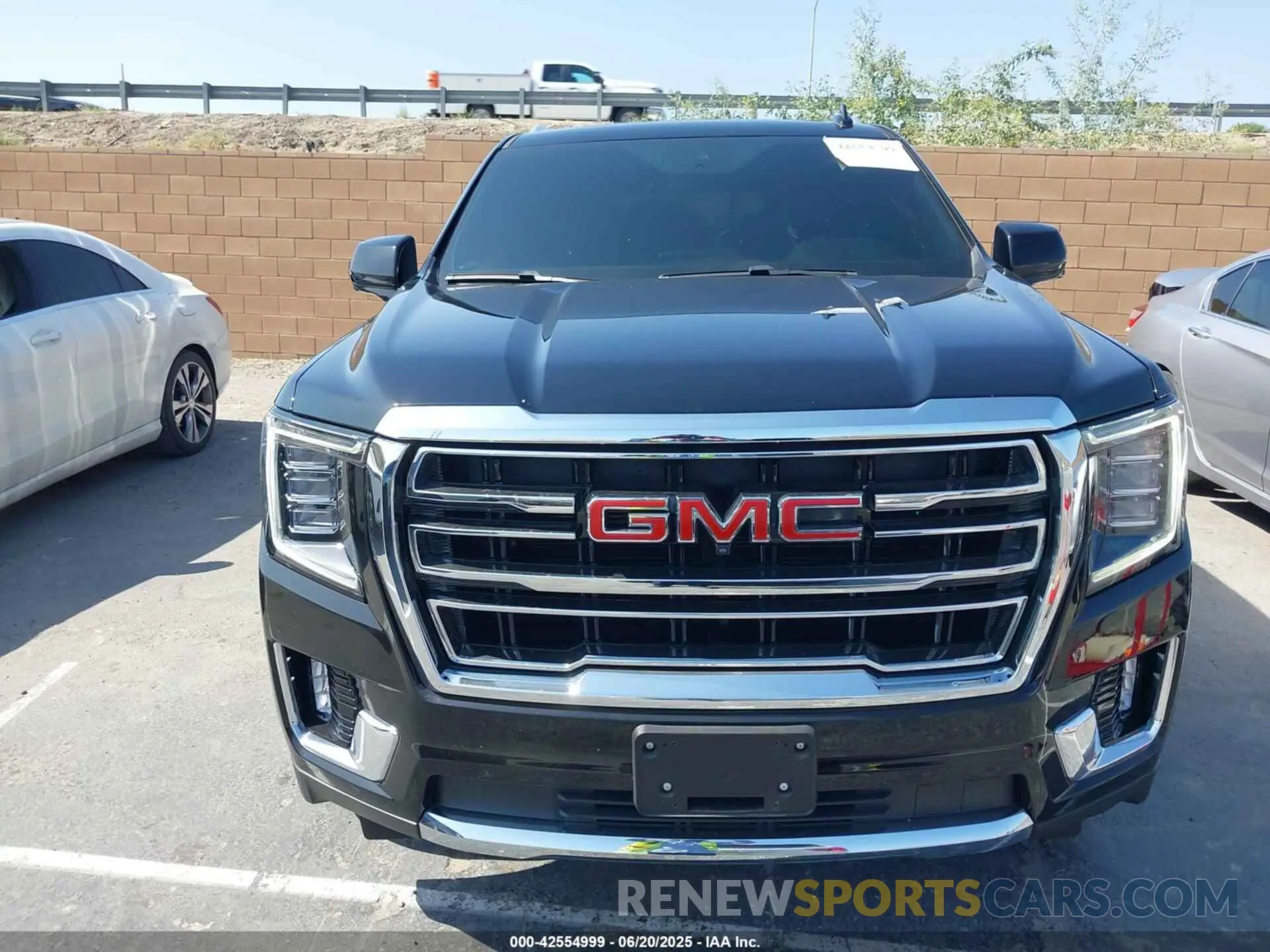 13 Photograph of a damaged car 1GKS2BKT3PR404670 GMC YUKON 2023