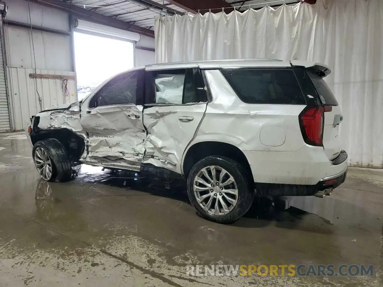2 Photograph of a damaged car 1GKS2DKL1PR392756 GMC YUKON 2023