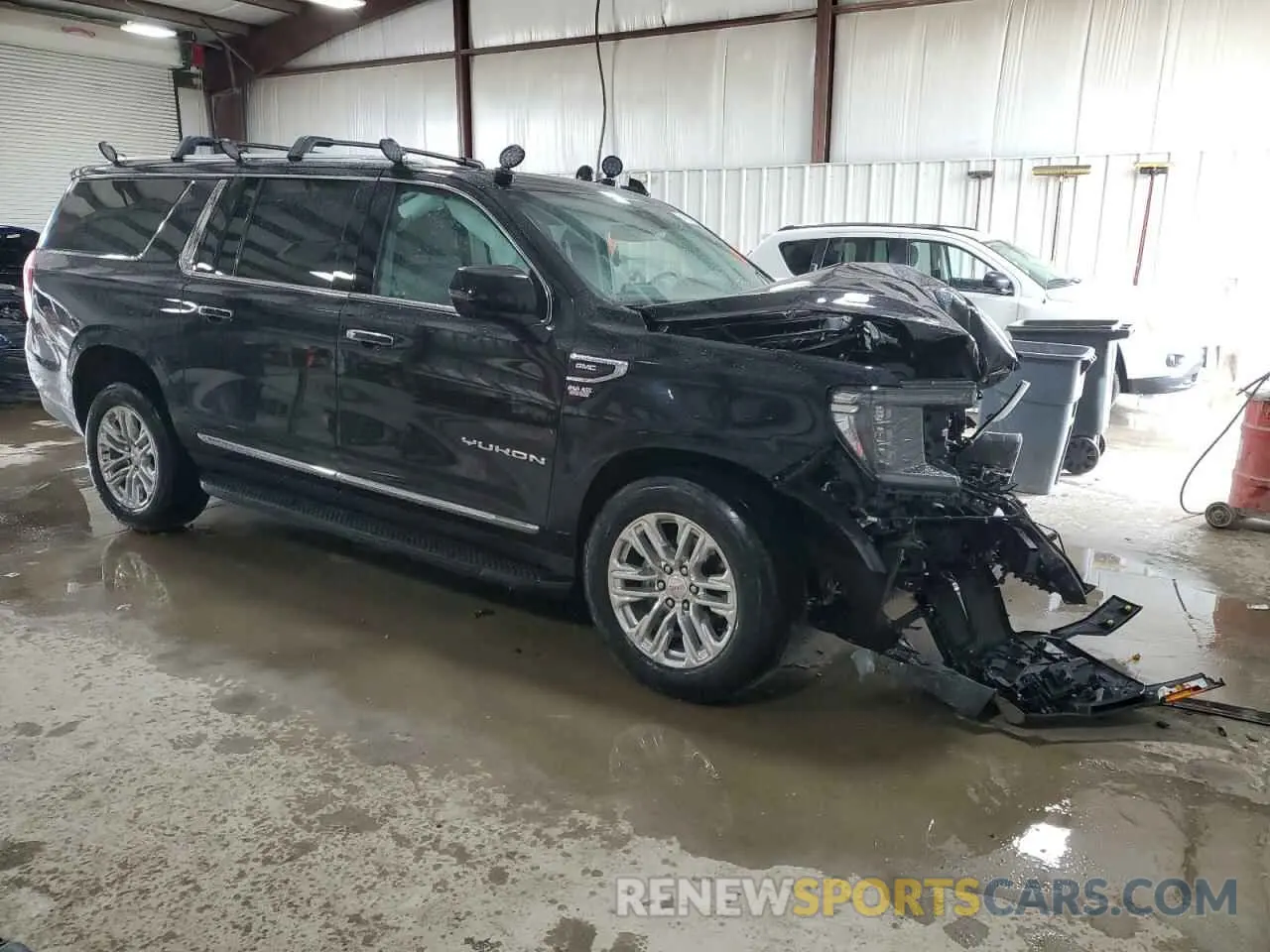4 Photograph of a damaged car 1GKS2GKD2PR255643 GMC YUKON 2023