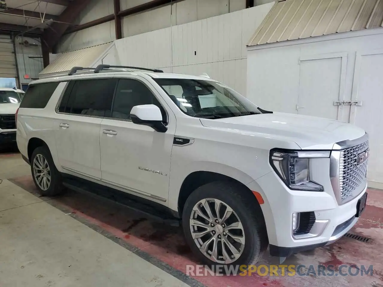 4 Photograph of a damaged car 1GKS2JKL2PR497370 GMC YUKON 2023
