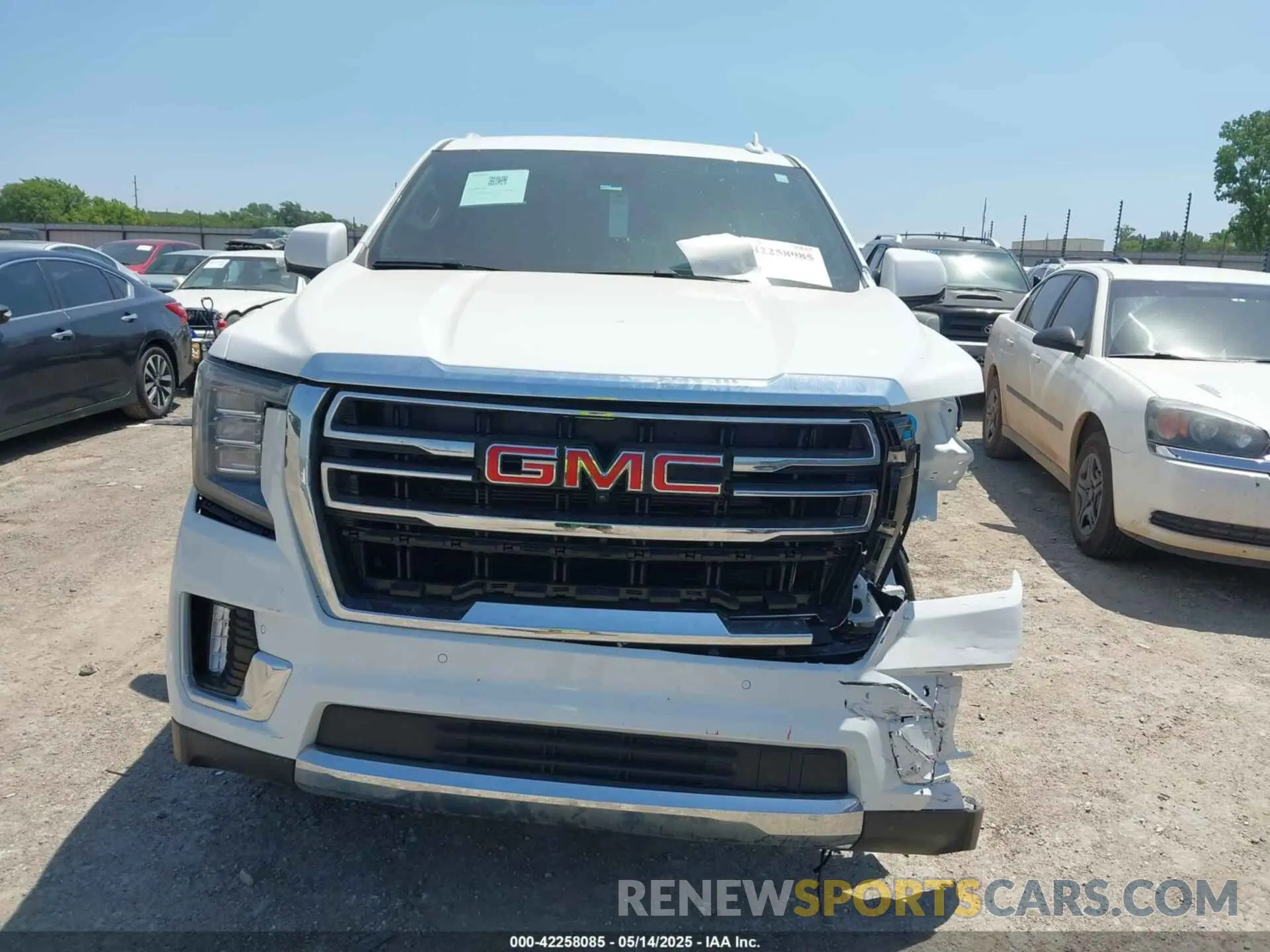 12 Photograph of a damaged car 1GKS1BKD1RR402057 GMC YUKON 2024