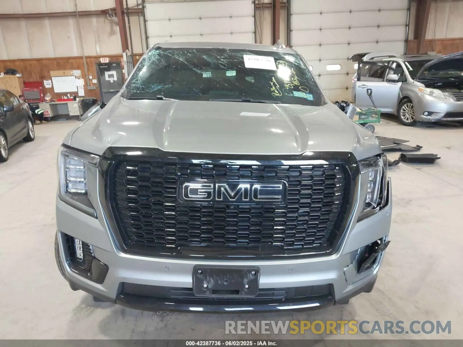 12 Photograph of a damaged car 1GKS2BKD1RR380932 GMC YUKON 2024