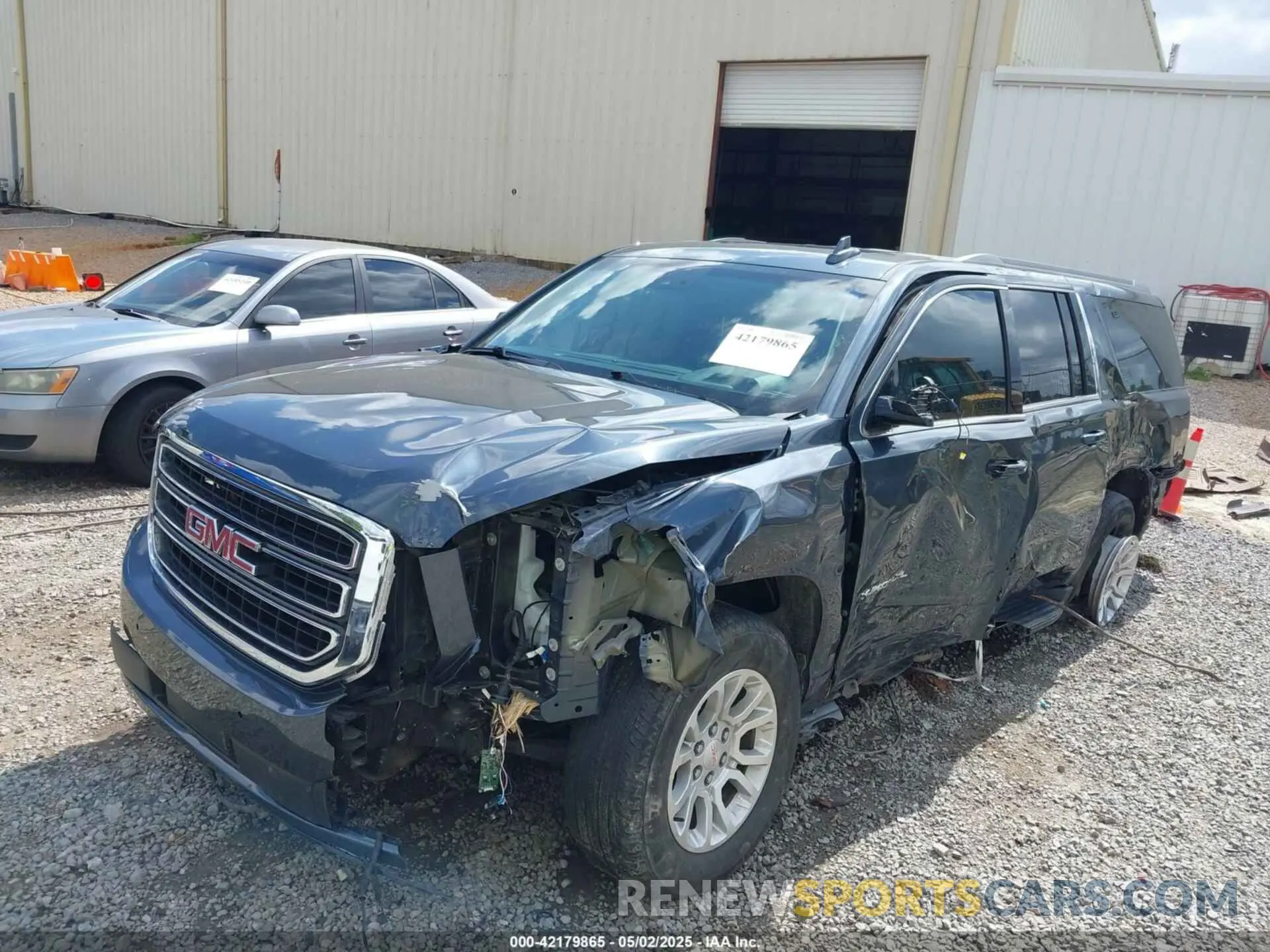 6 Photograph of a damaged car 1GKS1GKC5KR375939 GMC YUKON XL 2019