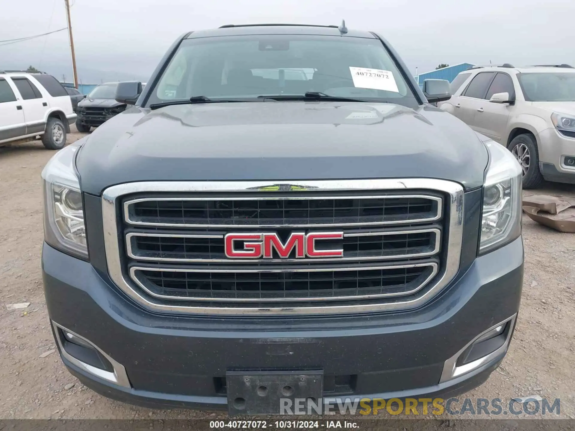 13 Photograph of a damaged car 1GKS2GKC0KR345860 GMC YUKON XL 2019