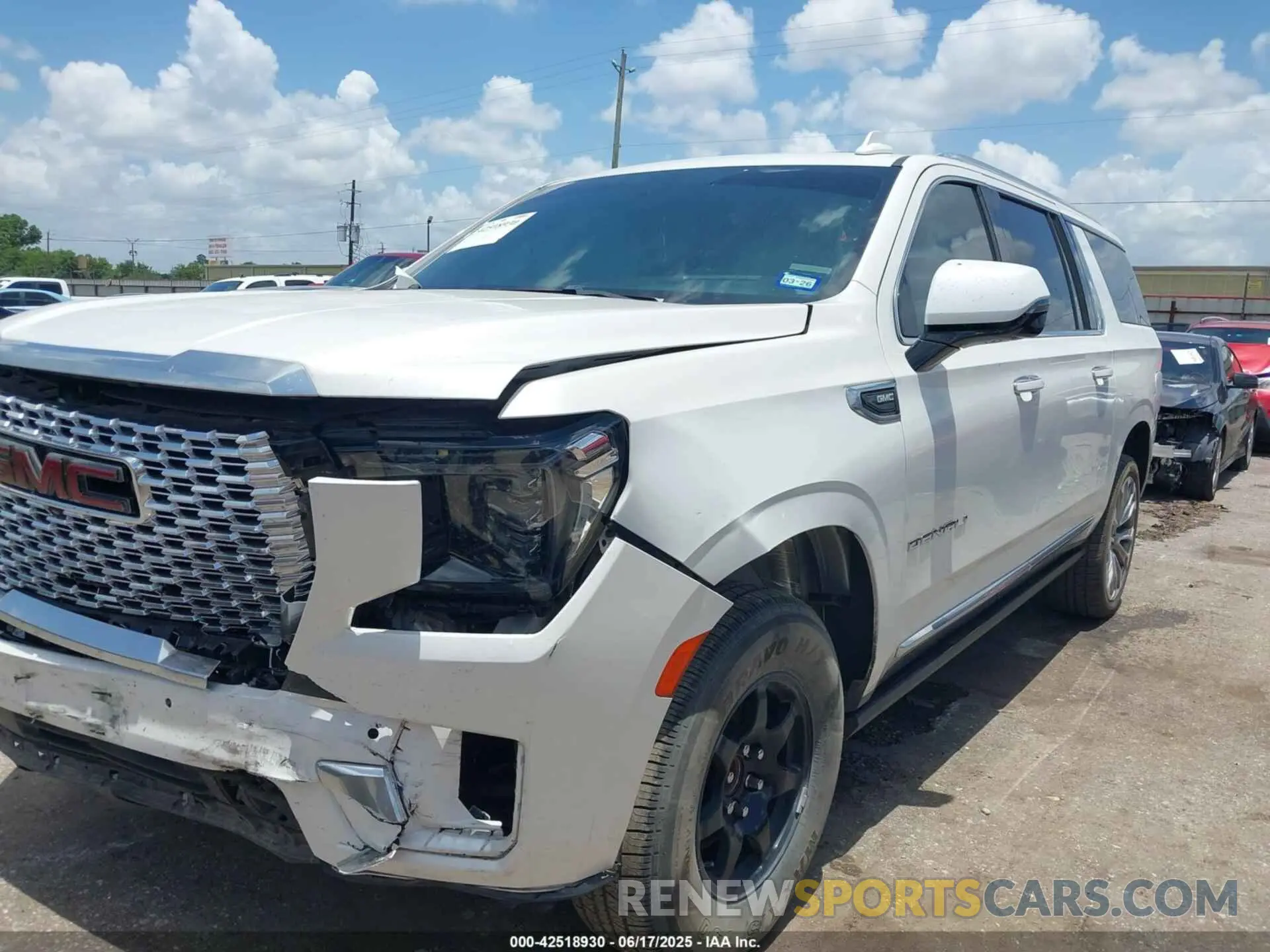 2 Photograph of a damaged car 1GKS1JKL3MR301029 GMC YUKON XL 2021