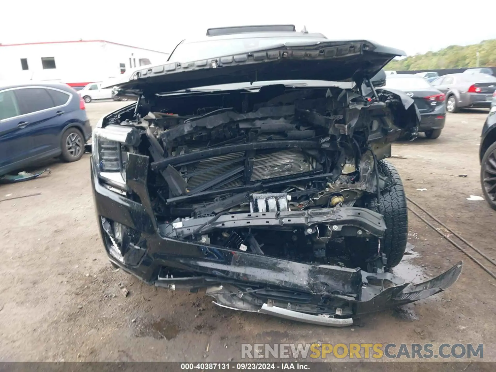 11 Photograph of a damaged car 1GKS2JKLXMR357630 GMC YUKON XL 2021