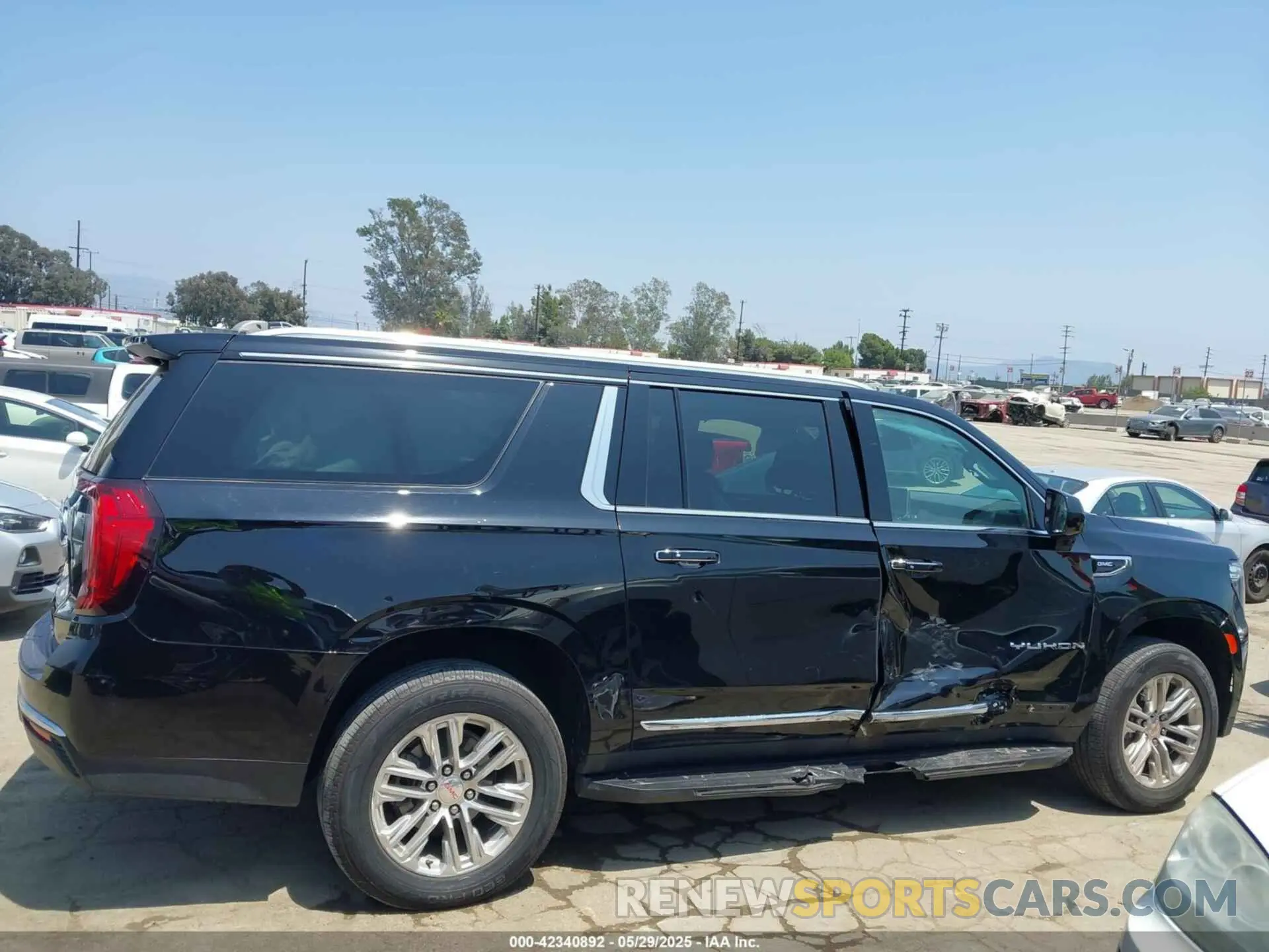 13 Photograph of a damaged car 1GKS1GKD7PR155430 GMC YUKON XL 2023