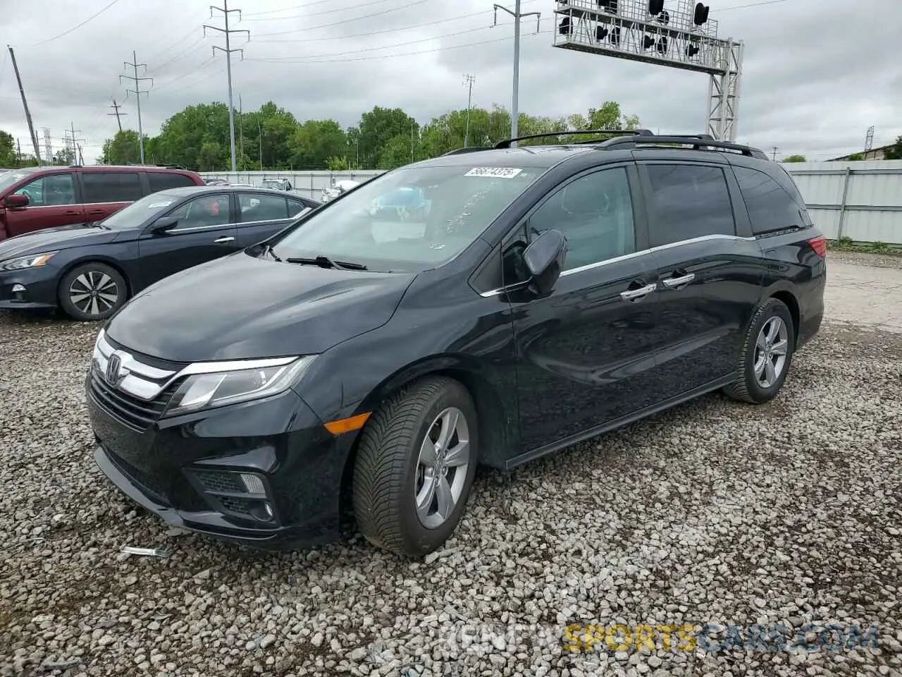 1 Photograph of a damaged car 5FNRL6H70KB038738 HONDA All Models 2019