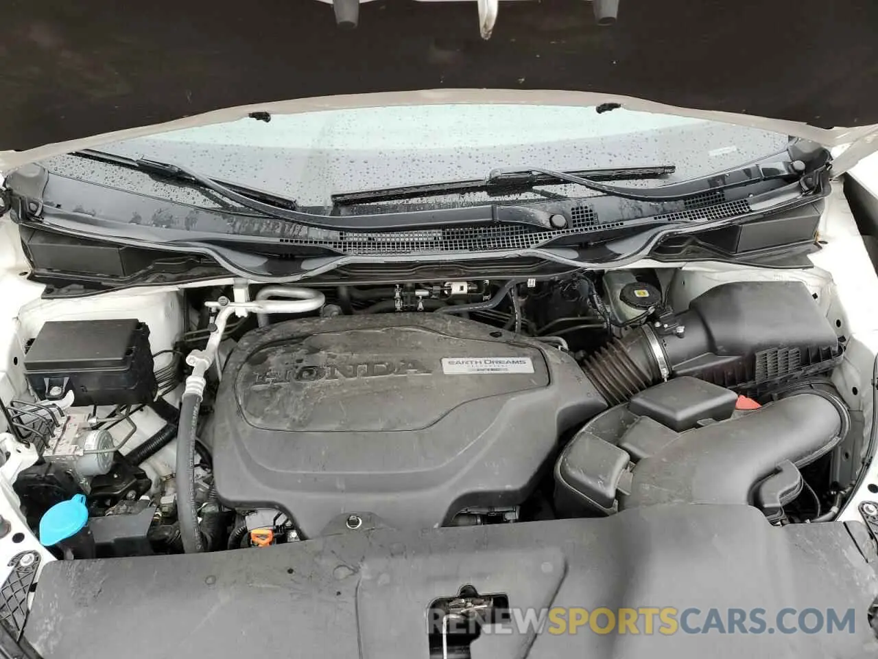 12 Photograph of a damaged car 5FNRL6H73KB057624 HONDA All Models 2019