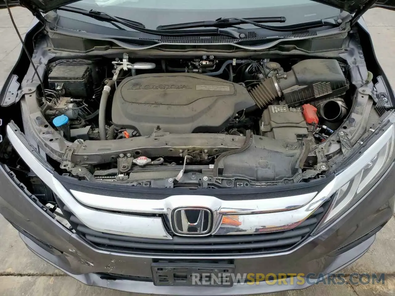 12 Photograph of a damaged car 5FNRL6H74KB069409 HONDA All Models 2019