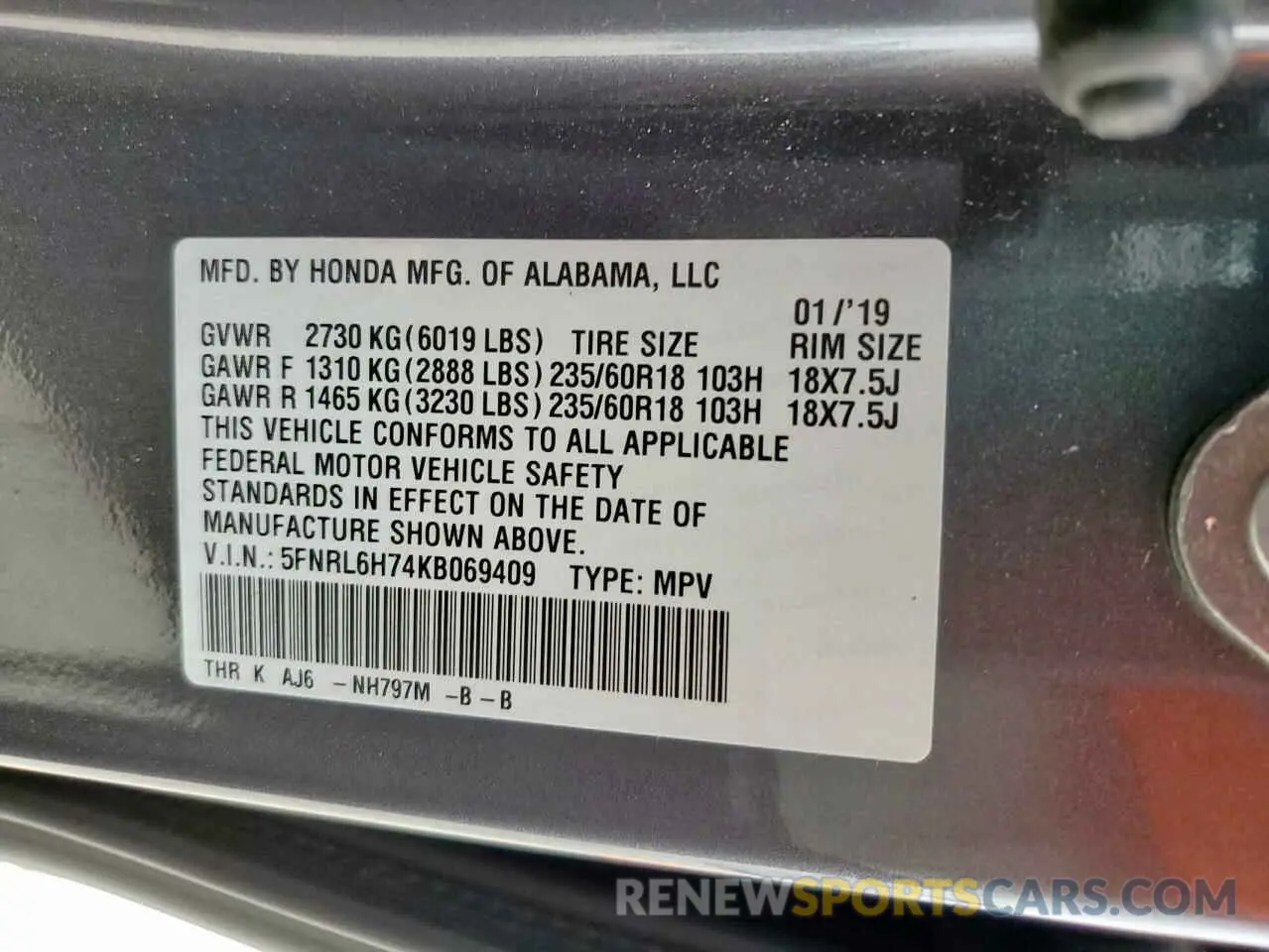 14 Photograph of a damaged car 5FNRL6H74KB069409 HONDA All Models 2019