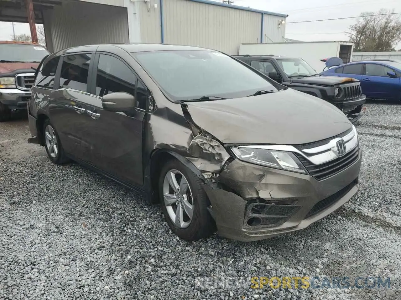 4 Photograph of a damaged car 5FNRL6H74KB099395 HONDA All Models 2019