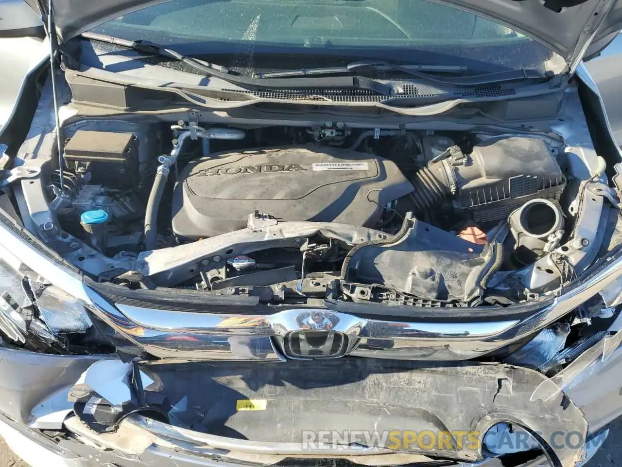 12 Photograph of a damaged car 5FNRL6H77KB043158 HONDA All Models 2019