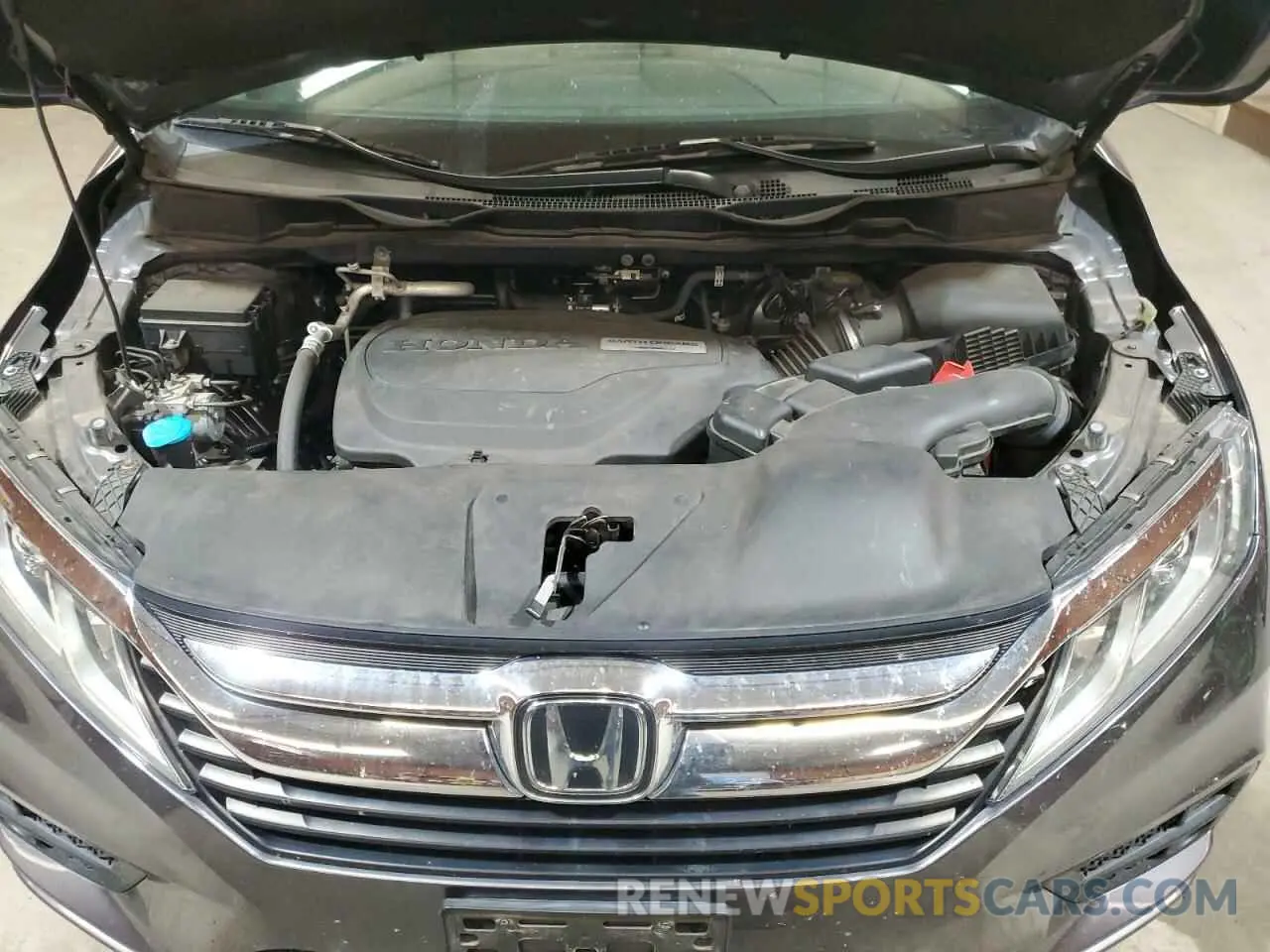 12 Photograph of a damaged car 5FNRL6H77KB110163 HONDA All Models 2019