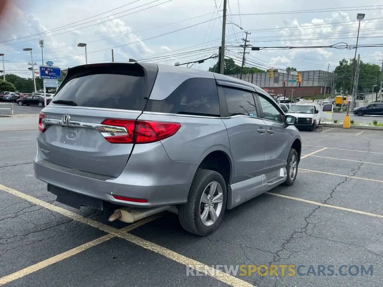 4 Photograph of a damaged car 5FNRL6H77KB122457 HONDA All Models 2019