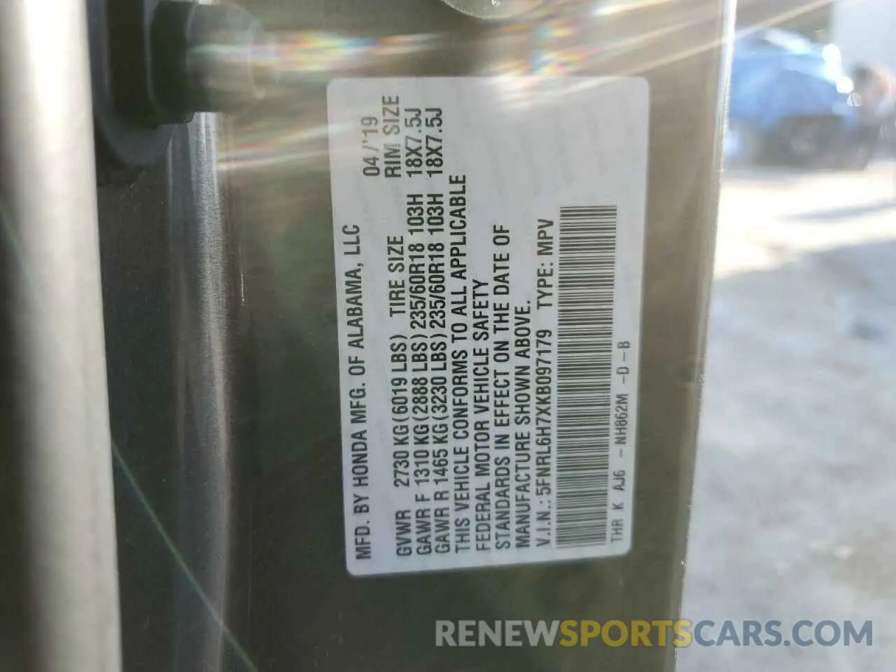 13 Photograph of a damaged car 5FNRL6H7XKB097179 HONDA All Models 2019