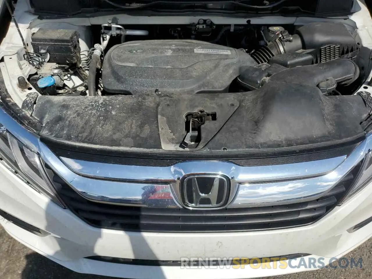 12 Photograph of a damaged car 5FNRL6H79LB040523 HONDA All Models 2020