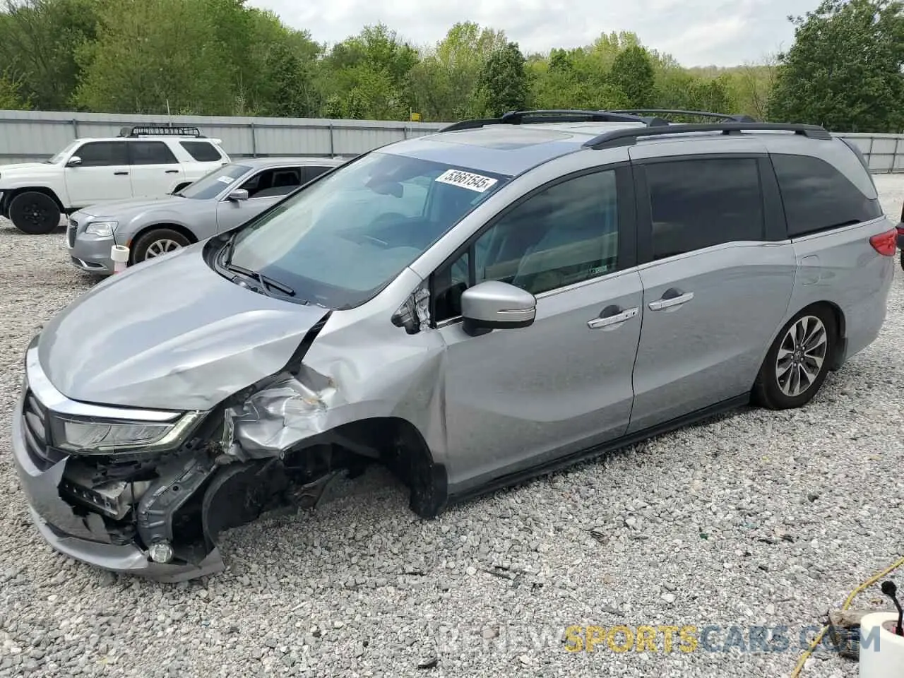 1 Photograph of a damaged car 5FNRL6H73NB029519 HONDA All Models 2022