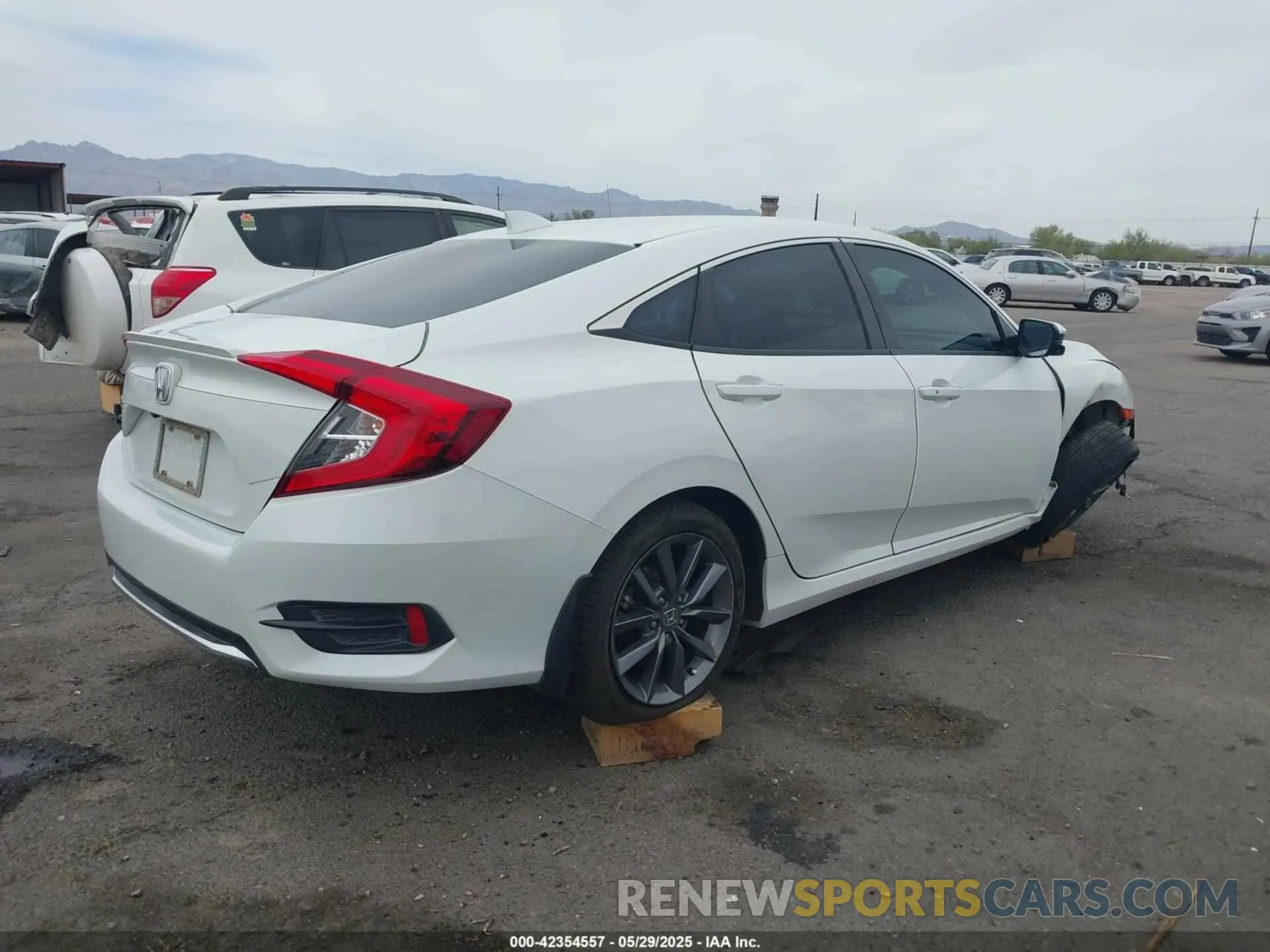 4 Photograph of a damaged car 19XFC1F35KE214324 HONDA CIVIC 2019