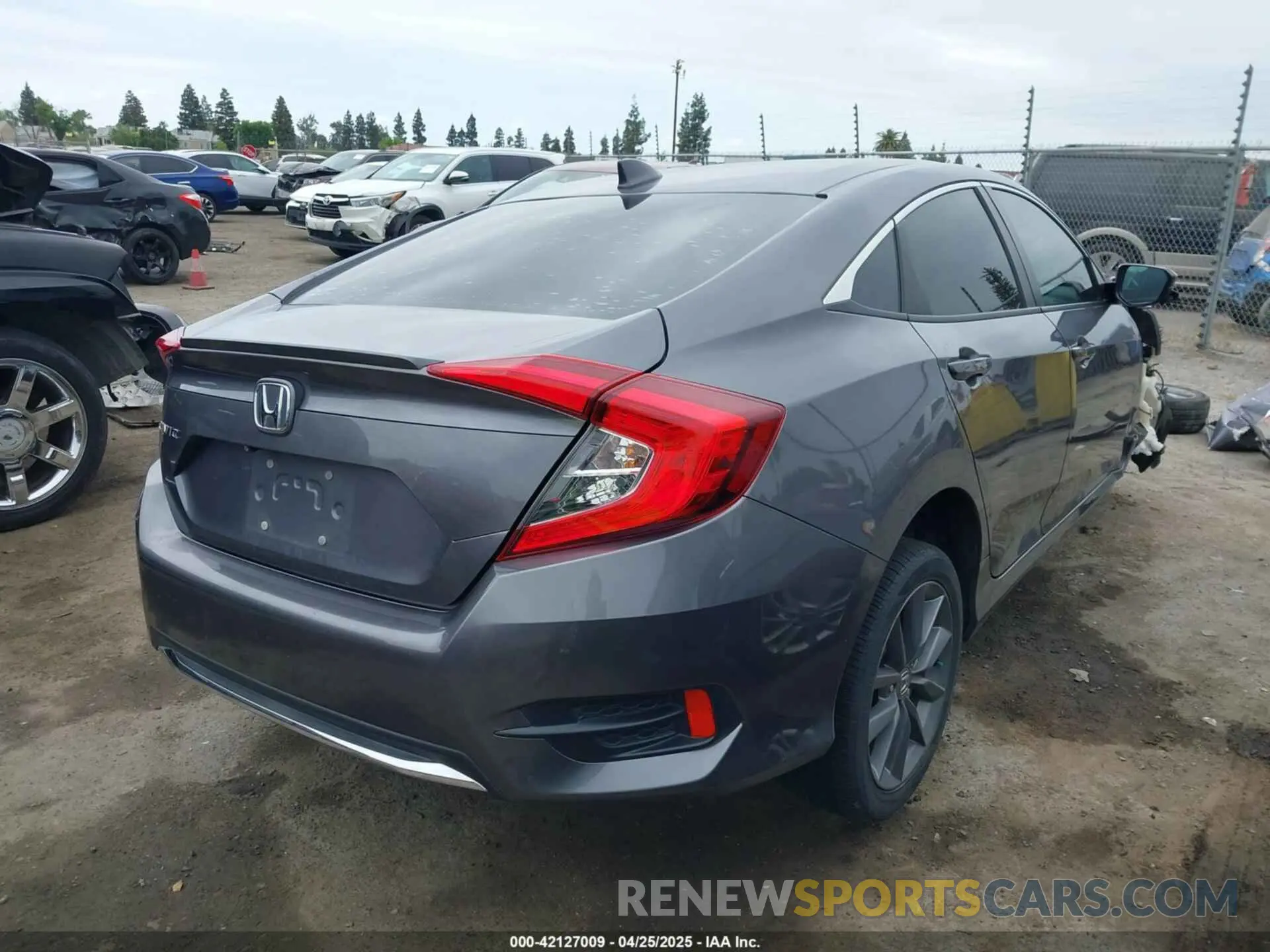 4 Photograph of a damaged car 19XFC1F3XKE211435 HONDA CIVIC 2019