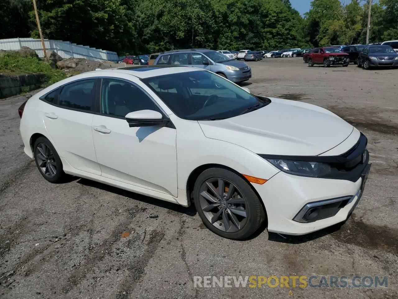 4 Photograph of a damaged car 19XFC1F3XKE214044 HONDA CIVIC 2019
