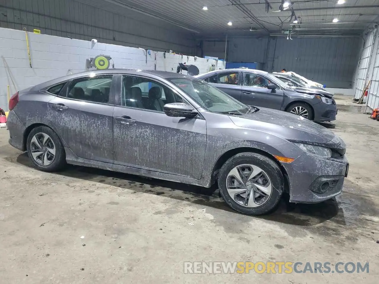 4 Photograph of a damaged car 19XFC2F61KE000947 HONDA CIVIC 2019