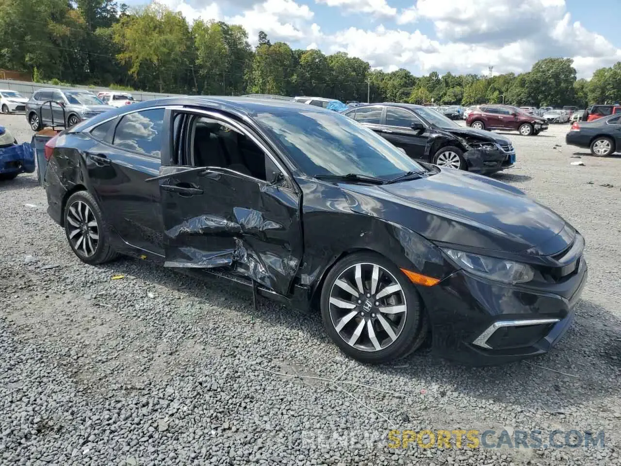 4 Photograph of a damaged car 19XFC2F63KE030905 HONDA CIVIC 2019