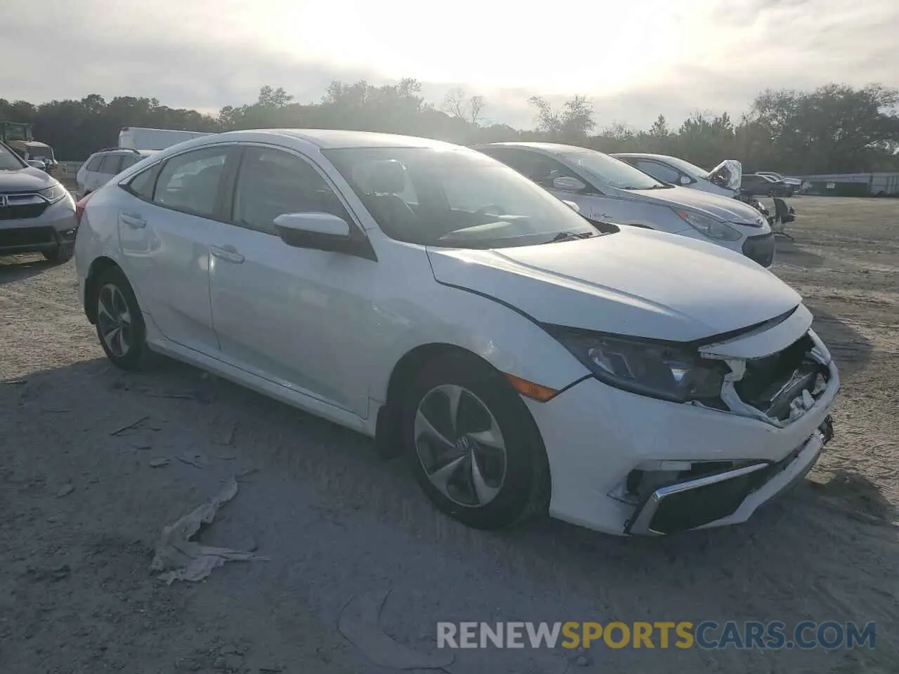 4 Photograph of a damaged car 19XFC2F65KE025463 HONDA CIVIC 2019