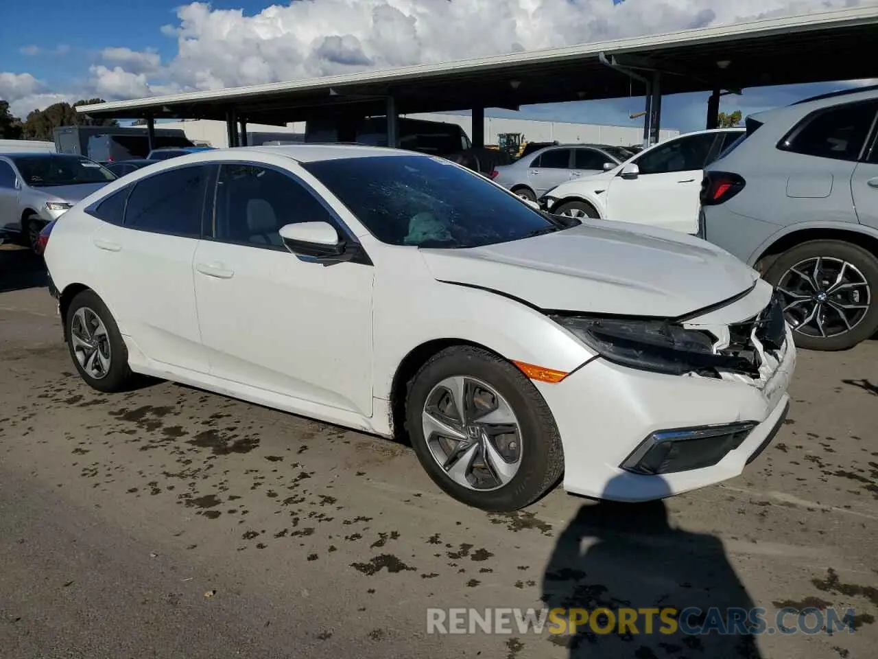 4 Photograph of a damaged car 19XFC2F66KE205213 HONDA CIVIC 2019