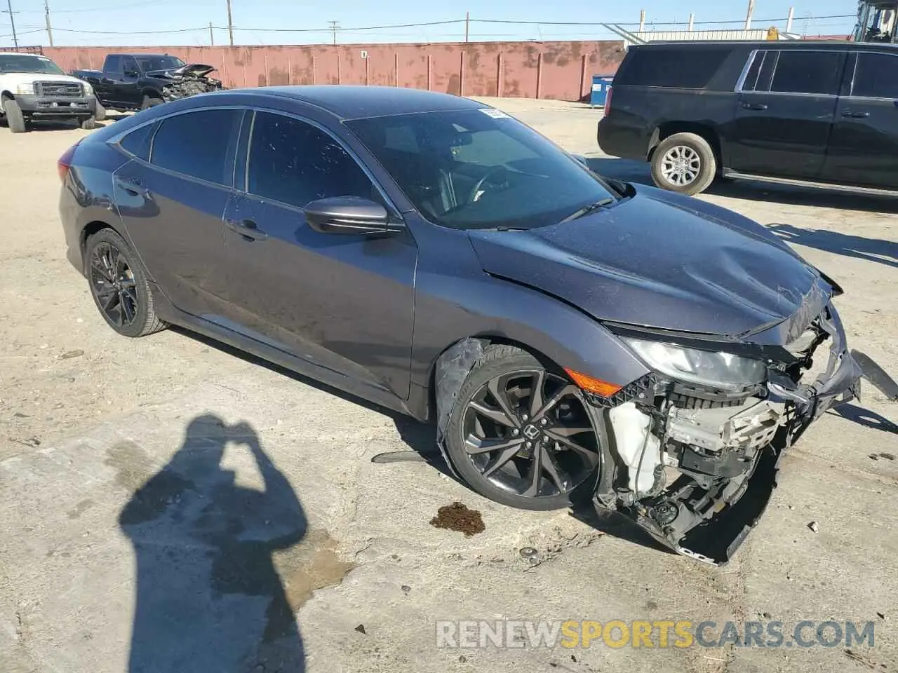 4 Photograph of a damaged car 19XFC2F83KE215358 HONDA CIVIC 2019