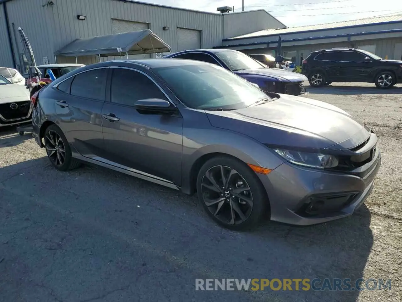 4 Photograph of a damaged car 19XFC2F85KE050798 HONDA CIVIC 2019