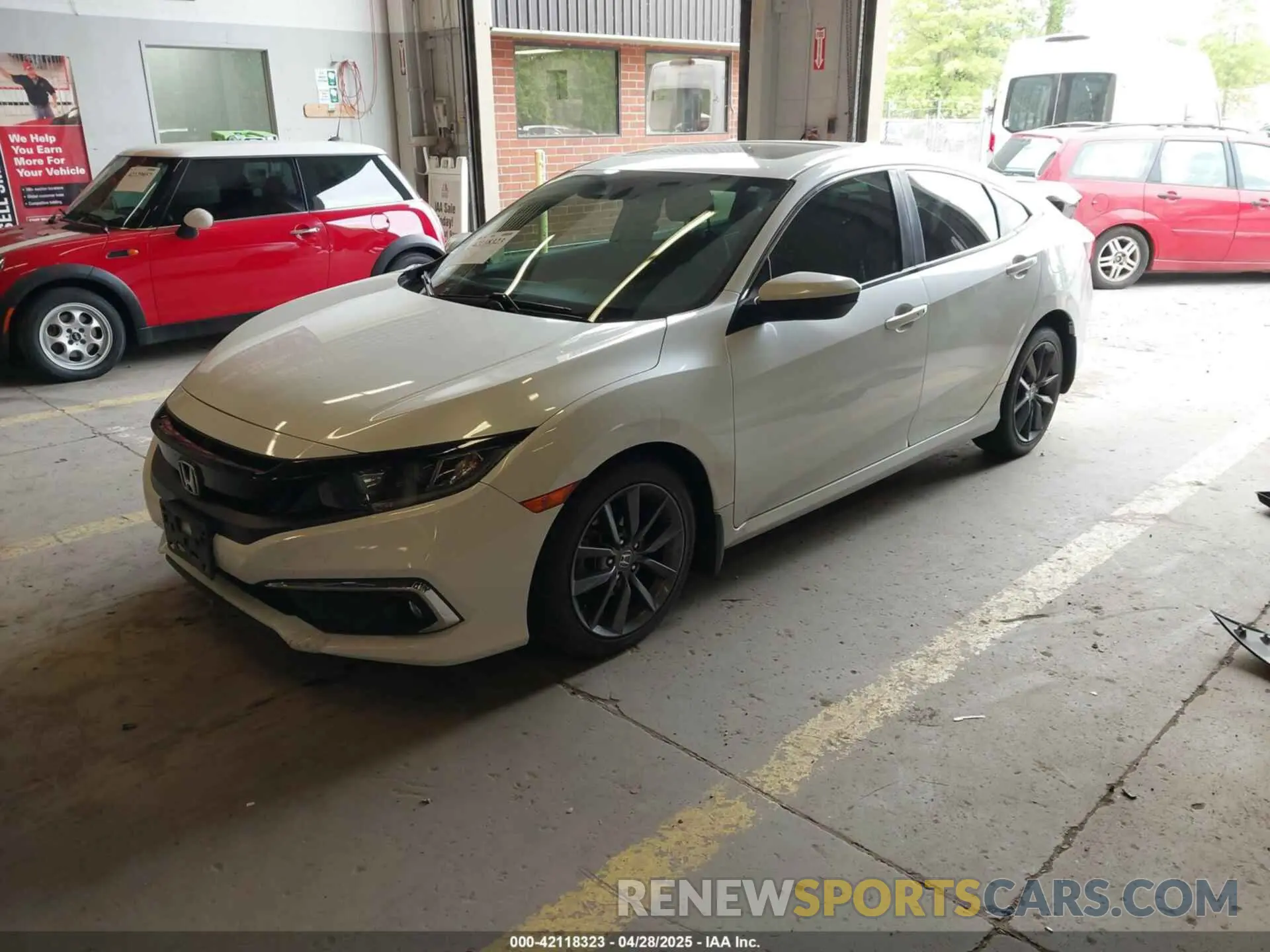 2 Photograph of a damaged car JHMFC1F7XKX009390 HONDA CIVIC 2019