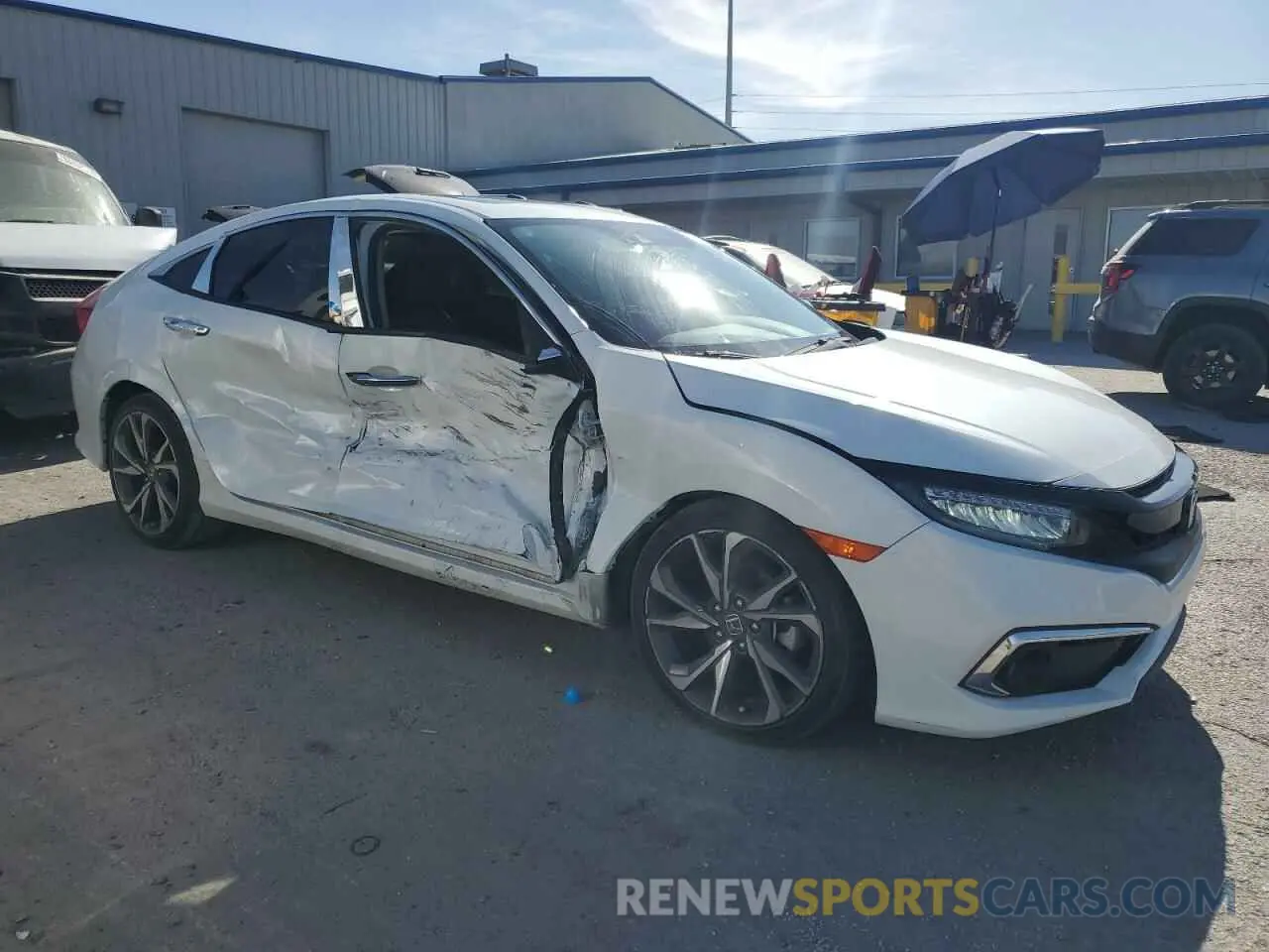4 Photograph of a damaged car JHMFC1F97KX002253 HONDA CIVIC 2019