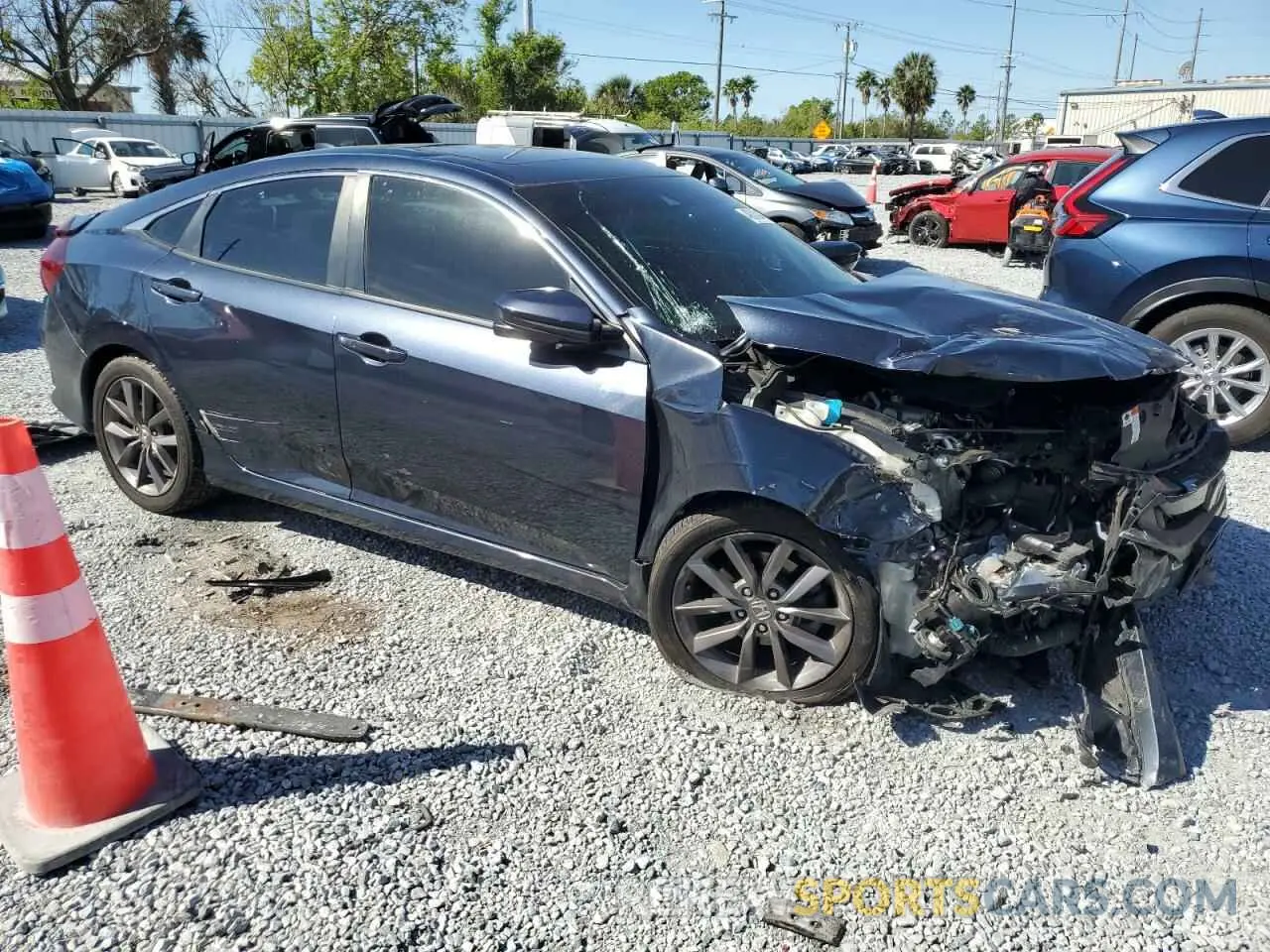 4 Photograph of a damaged car 19XFC1F3XLE024083 HONDA CIVIC 2020