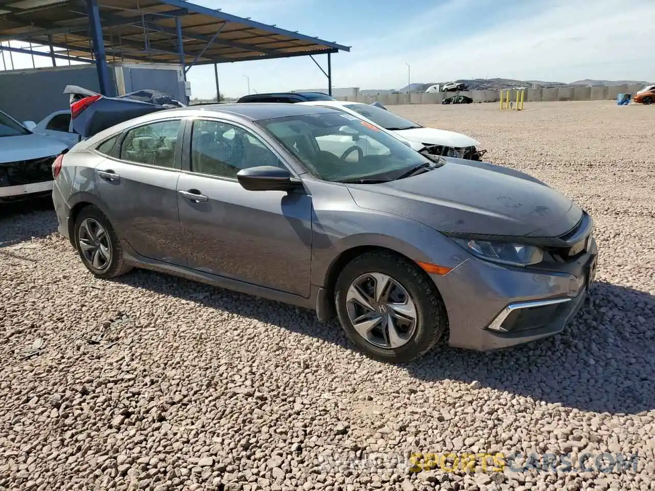 4 Photograph of a damaged car 19XFC2F65LE009345 HONDA CIVIC 2020