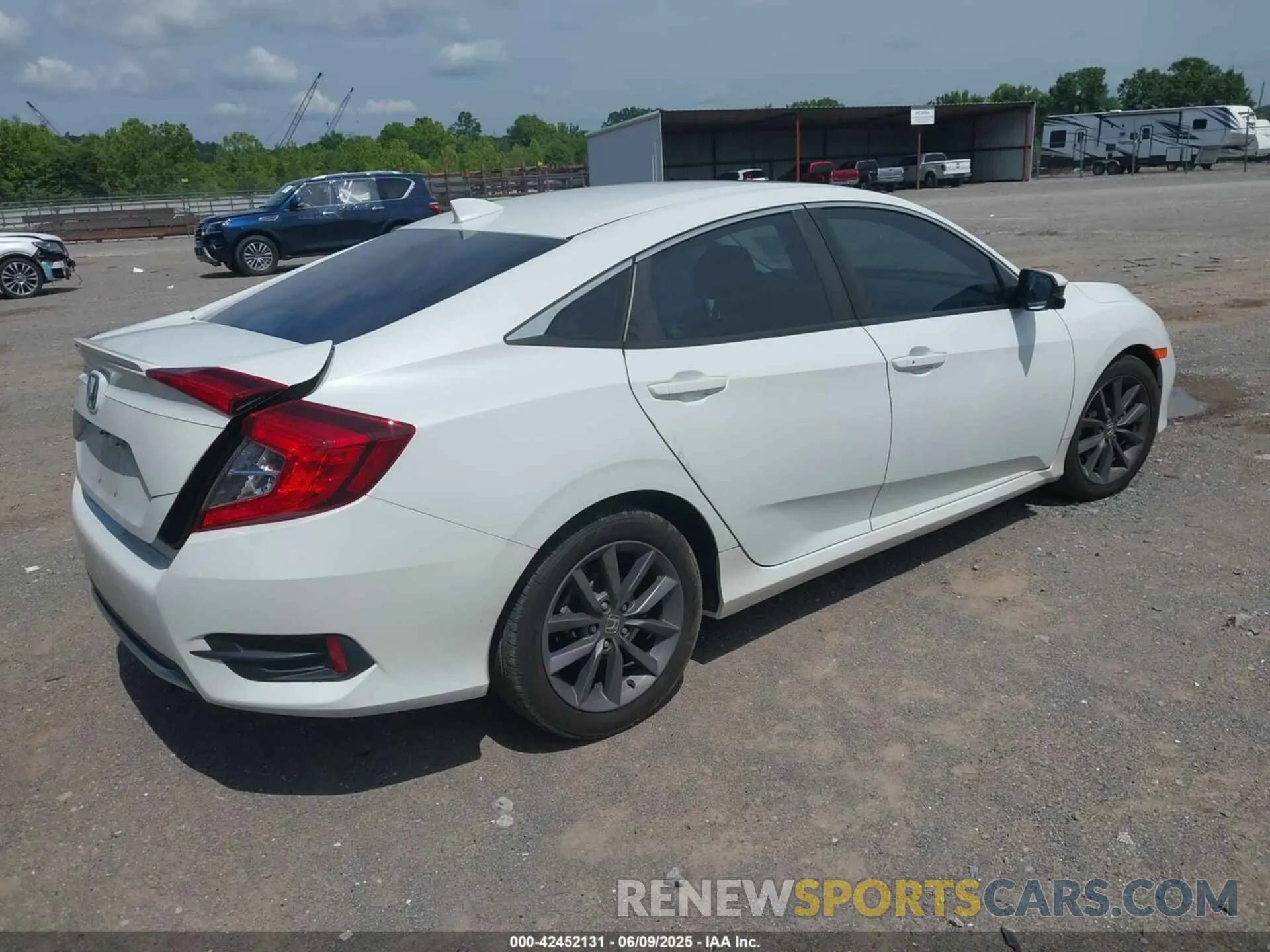4 Photograph of a damaged car 19XFC1F30ME011439 HONDA CIVIC 2021