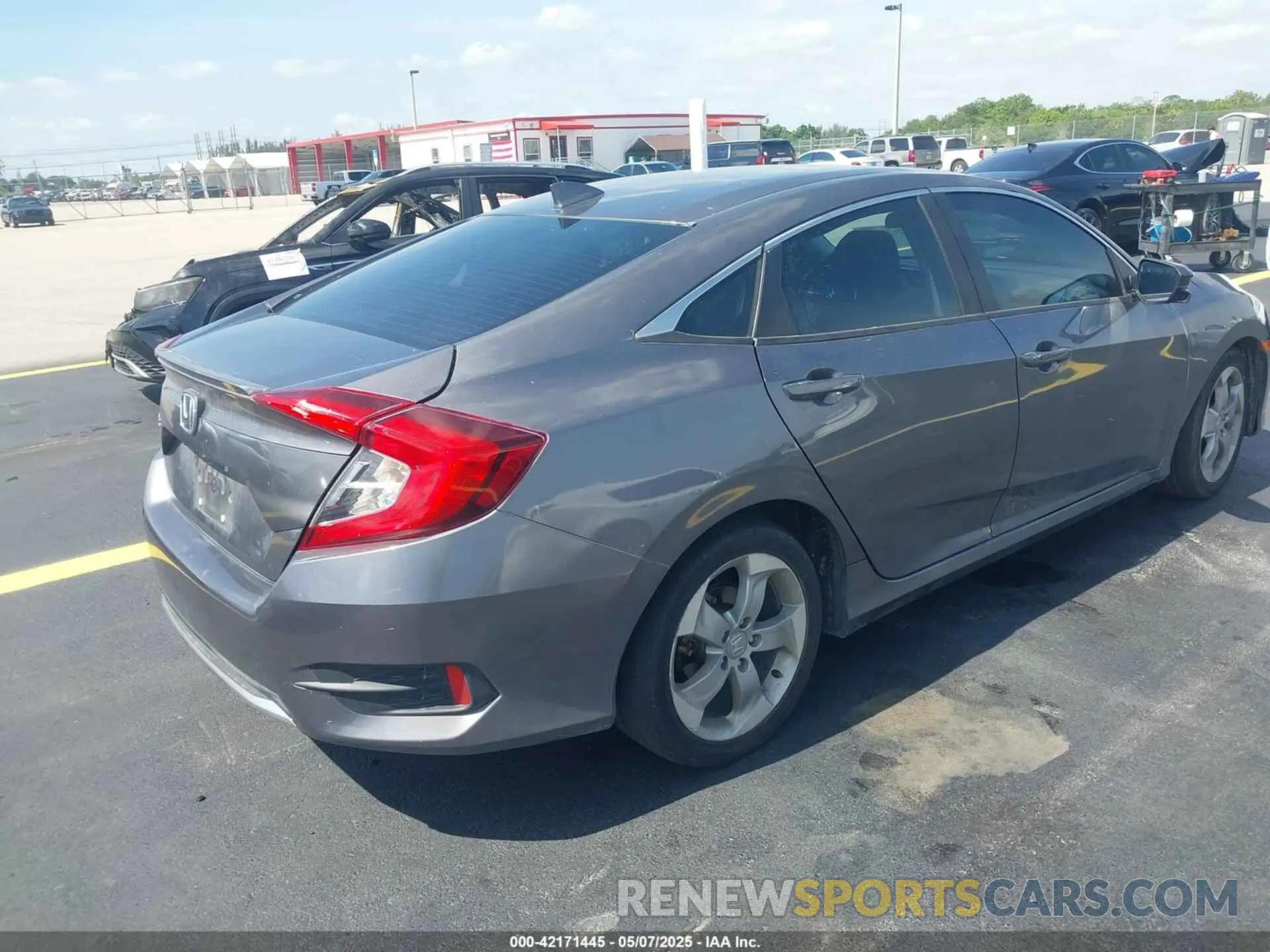4 Photograph of a damaged car 19XFC1F39ME014128 HONDA CIVIC 2021