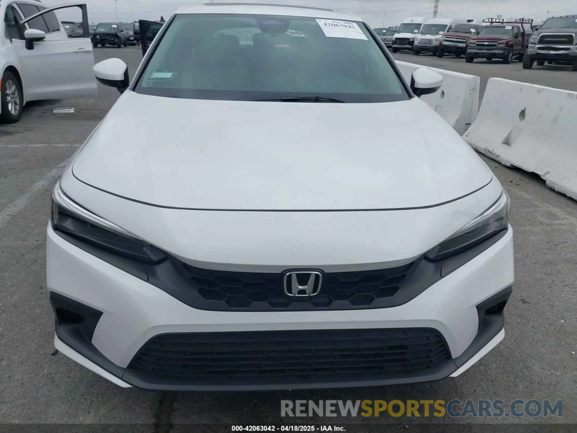 12 Photograph of a damaged car 19XFL1H74PE000657 HONDA CIVIC 2023