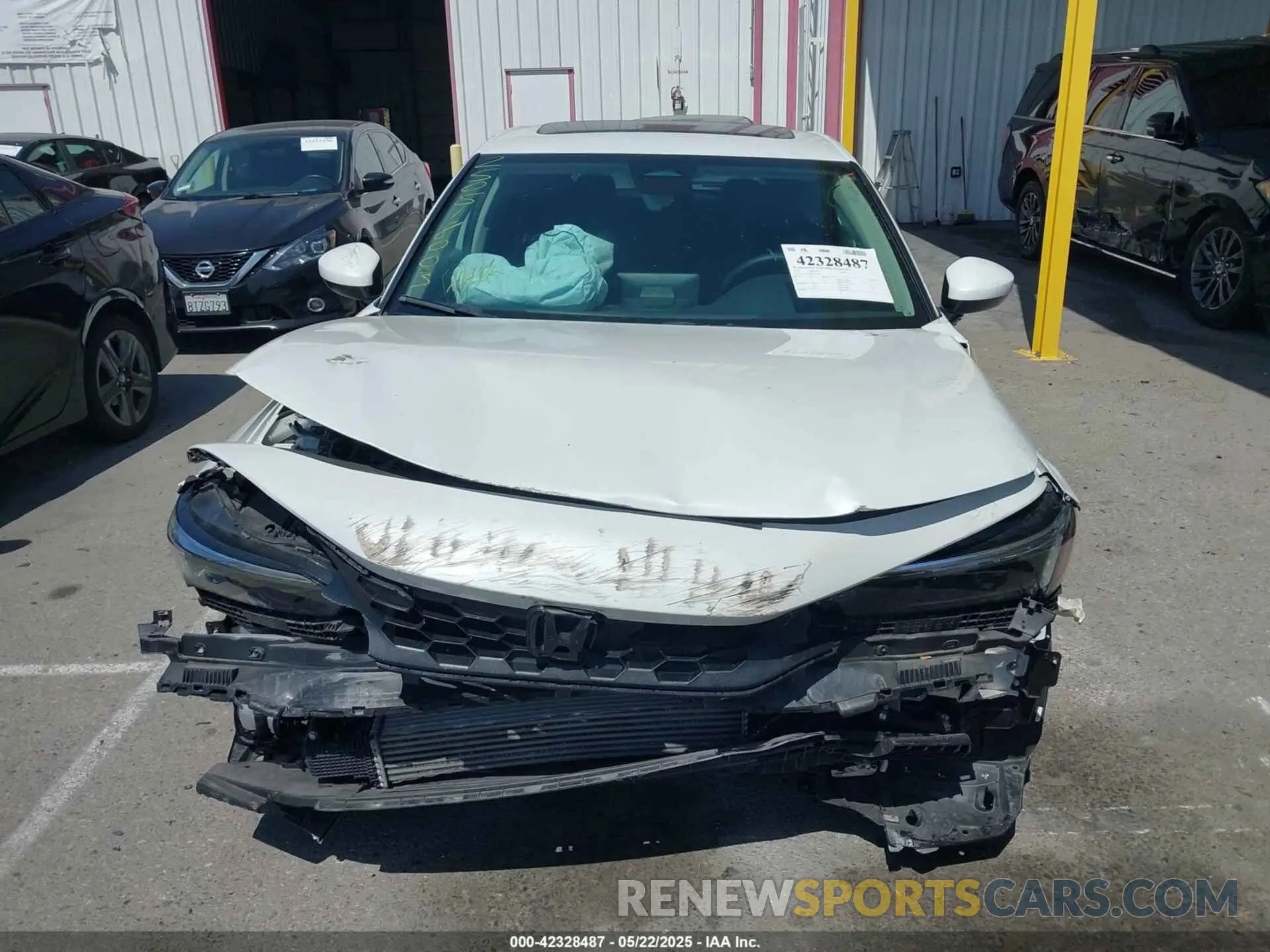 12 Photograph of a damaged car 19XFL1H76PE003575 HONDA CIVIC 2023