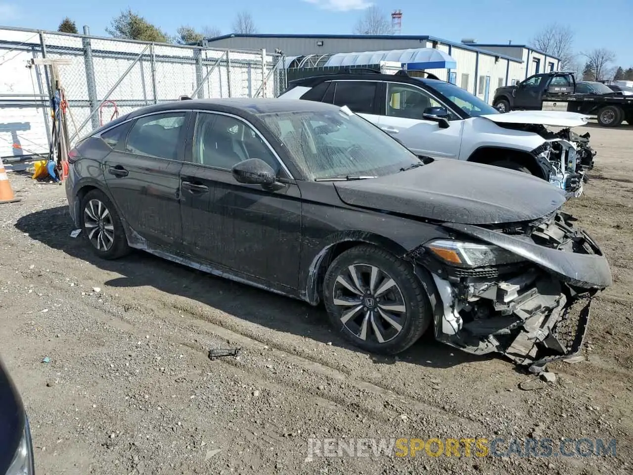 4 Photograph of a damaged car 19XFL1H76PE014348 HONDA CIVIC 2023