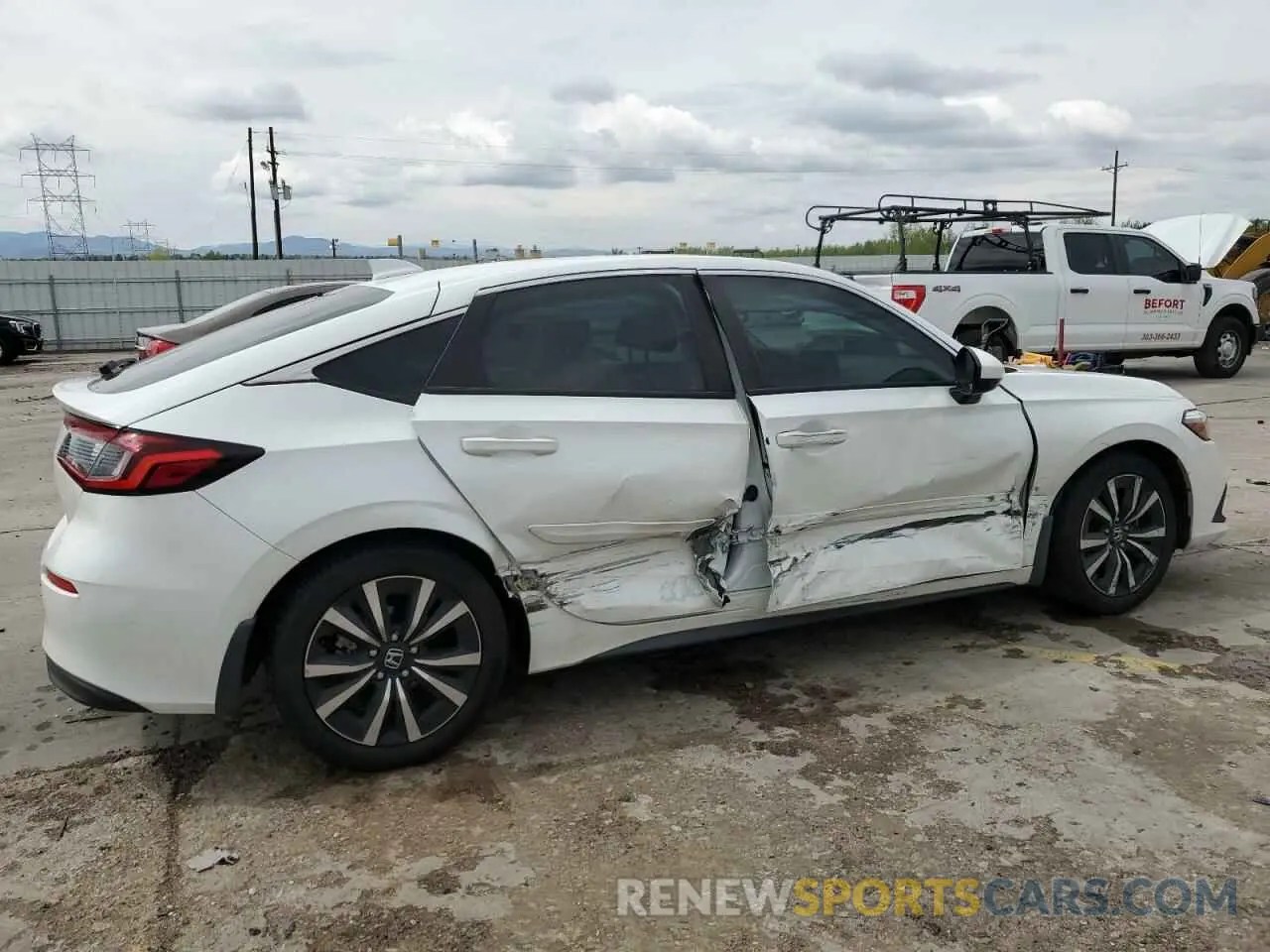 3 Photograph of a damaged car 19XFL1H77PE004864 HONDA CIVIC 2023
