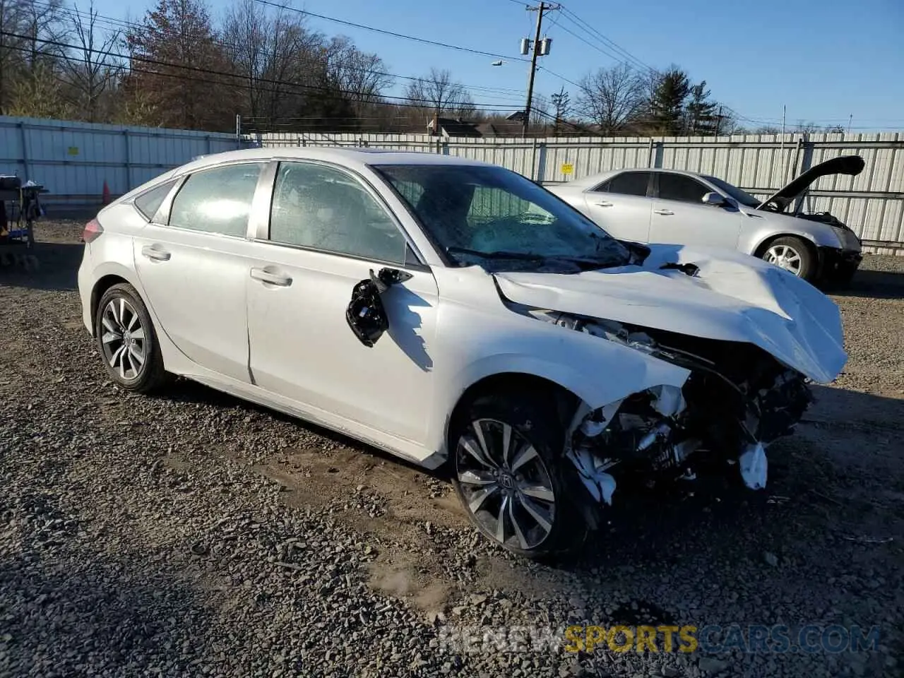 4 Photograph of a damaged car 19XFL1H77PE017128 HONDA CIVIC 2023