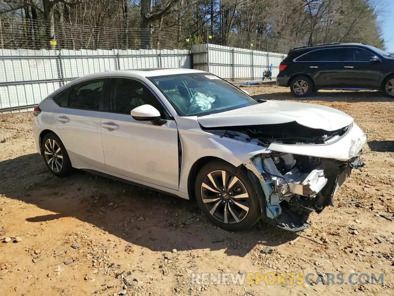 4 Photograph of a damaged car 19XFL1H78PE016005 HONDA CIVIC 2023